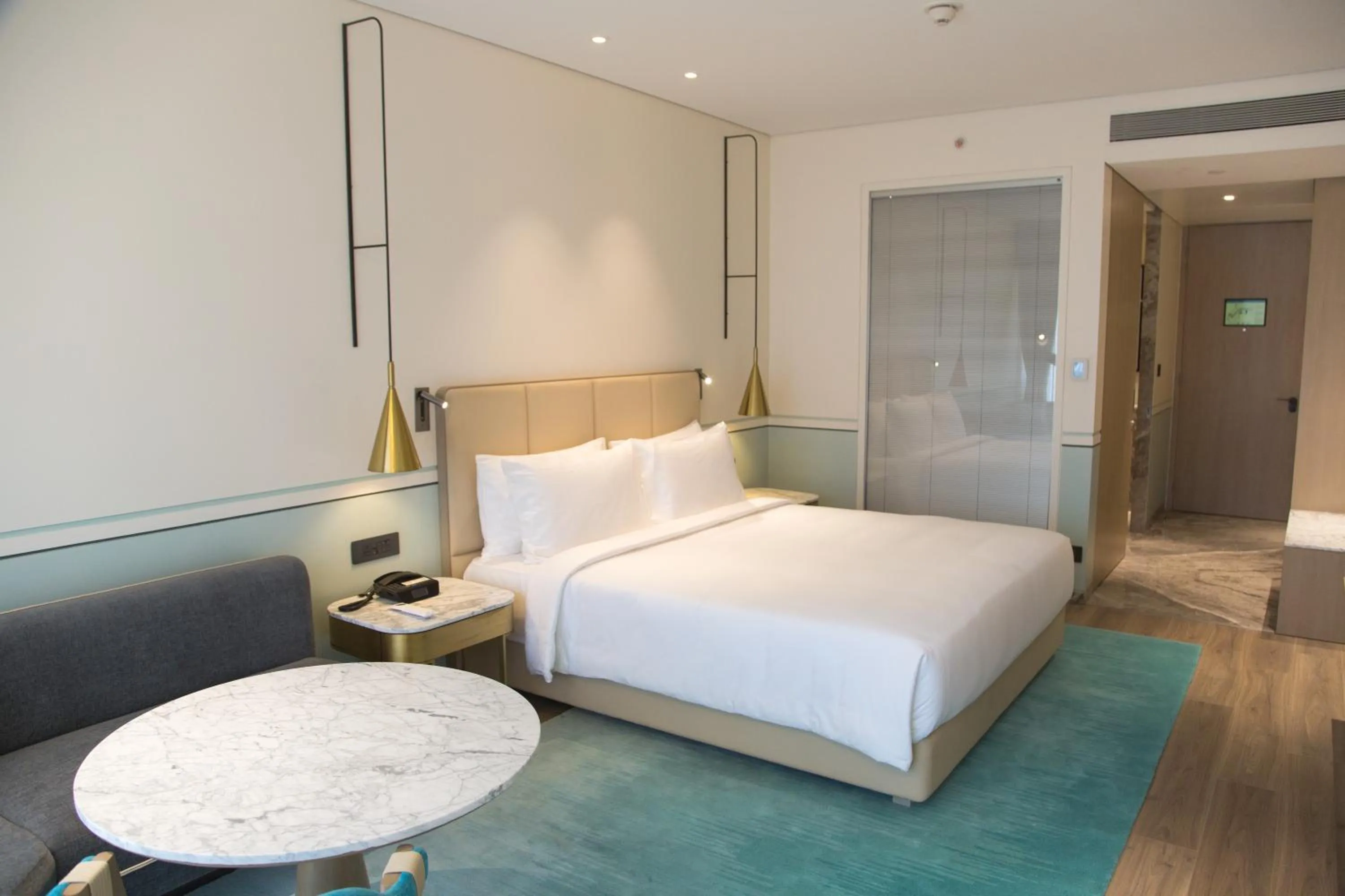 Photo of the whole room, Bed in Radisson Blu Mumbai International Airport