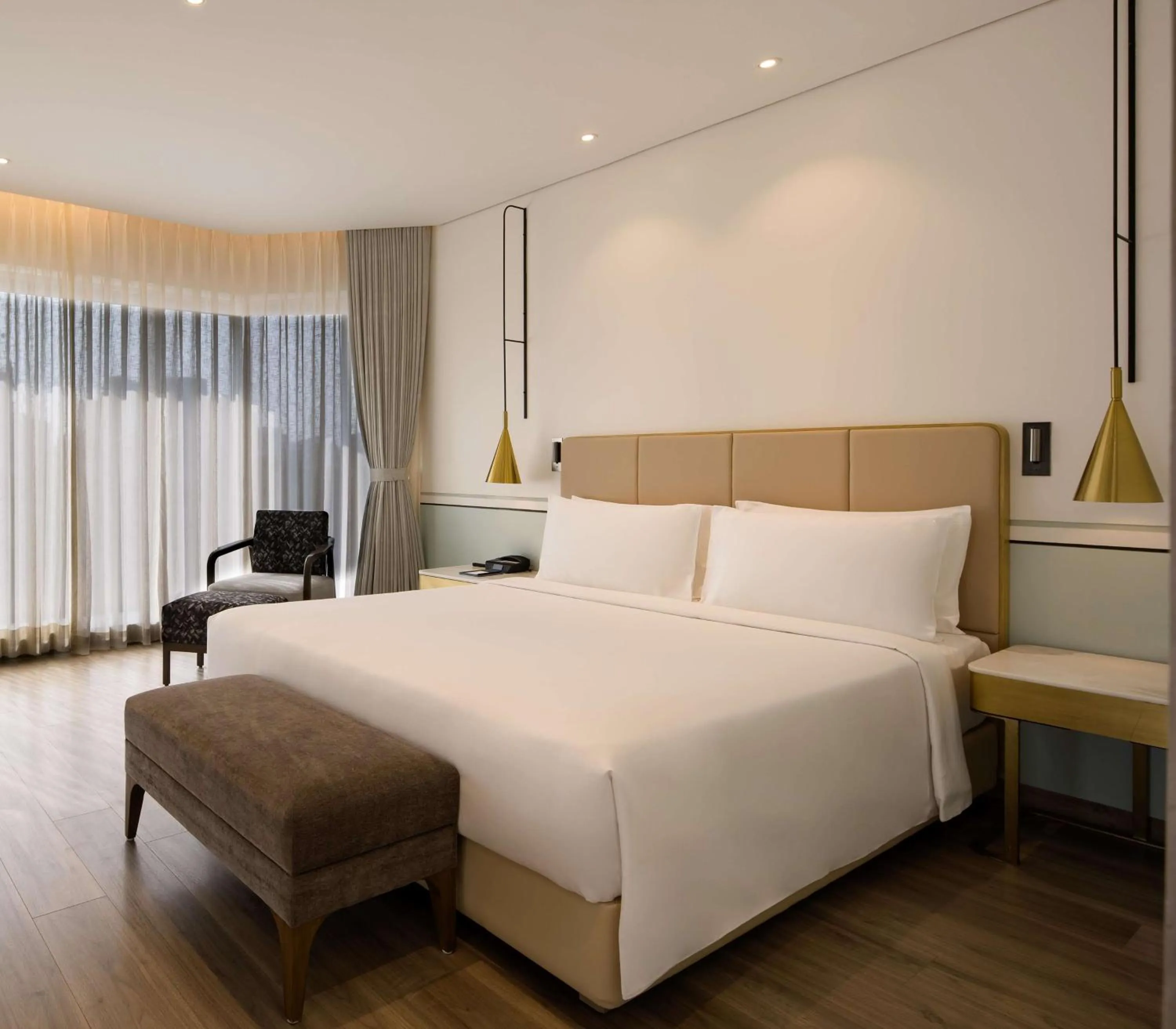 Photo of the whole room, Bed in Radisson Blu Mumbai International Airport
