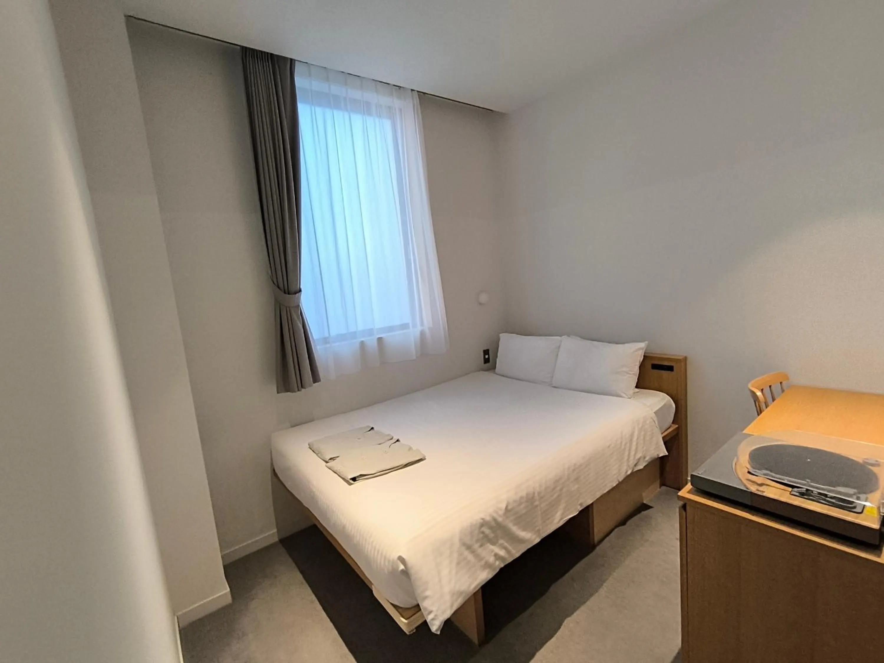 Bed in MUSTARD HOTEL SHIMOKITAZAWA