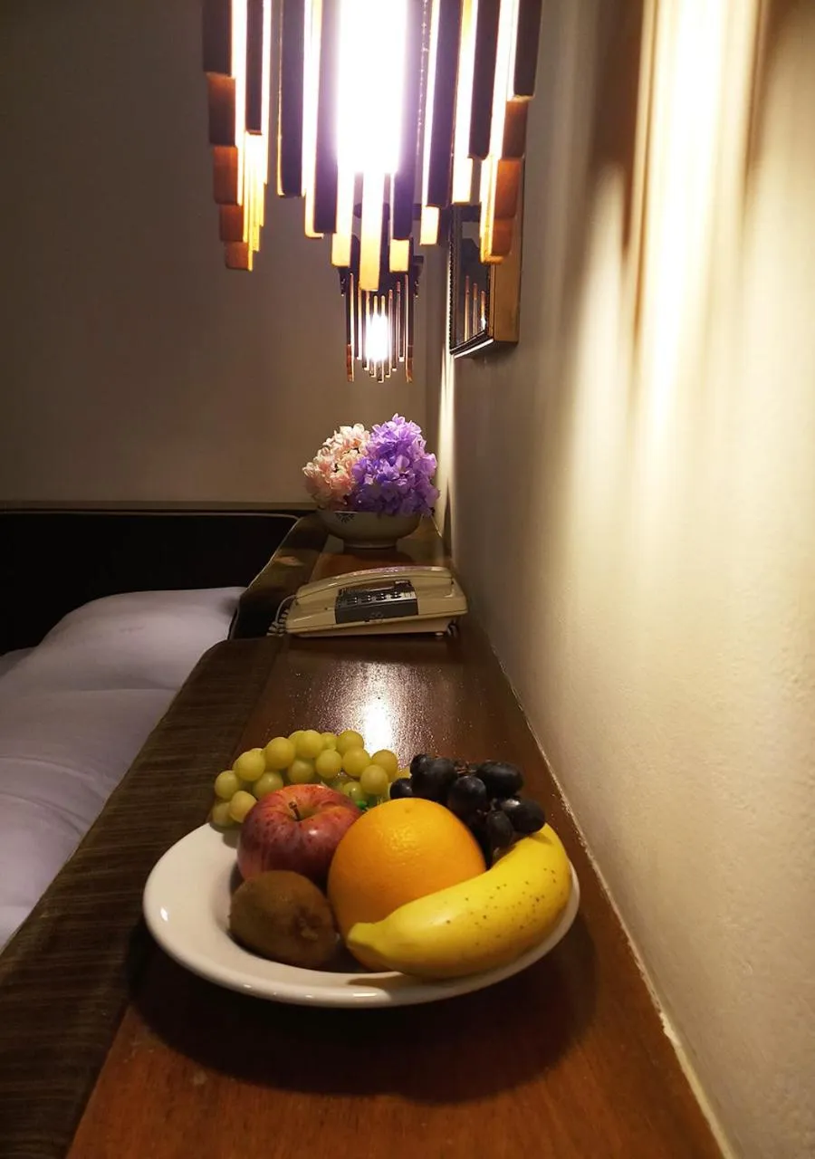 Decorative detail, Bed in Oriental Palace Hotel