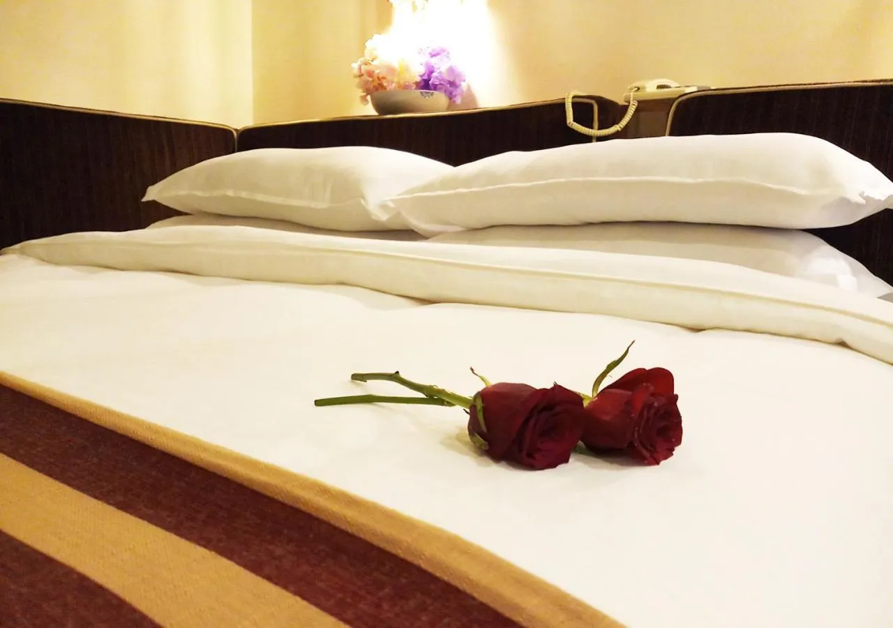 Decorative detail, Bed in Oriental Palace Hotel