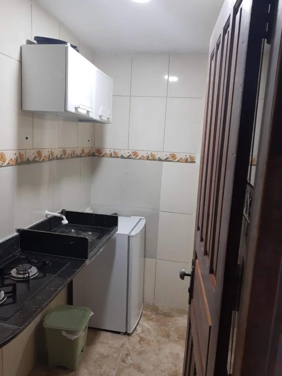 Kitchen or kitchenette in Suítes em Porto de Galinhas