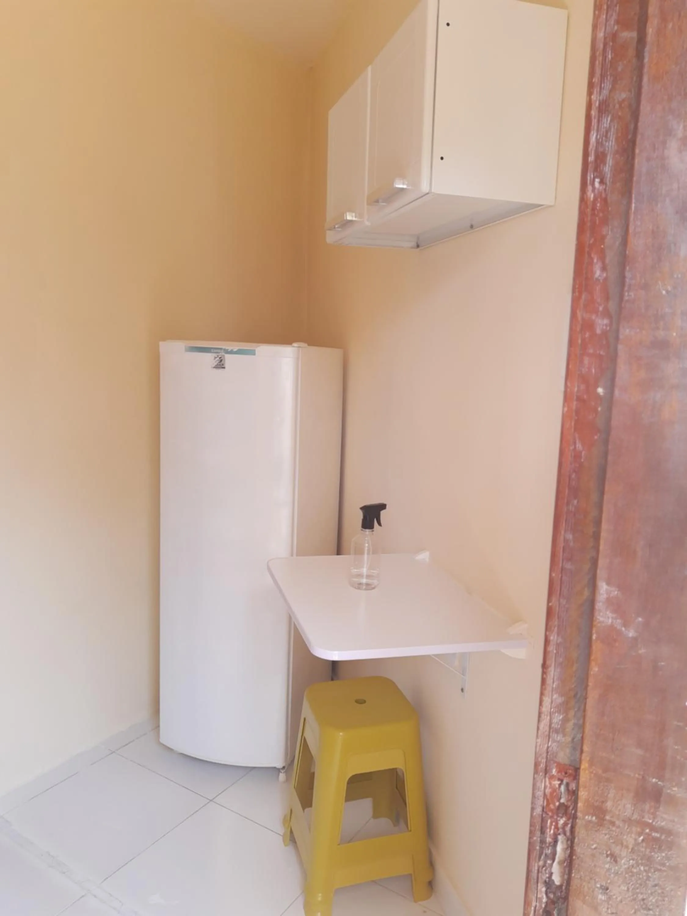 Kitchen or kitchenette in Suítes em Porto de Galinhas