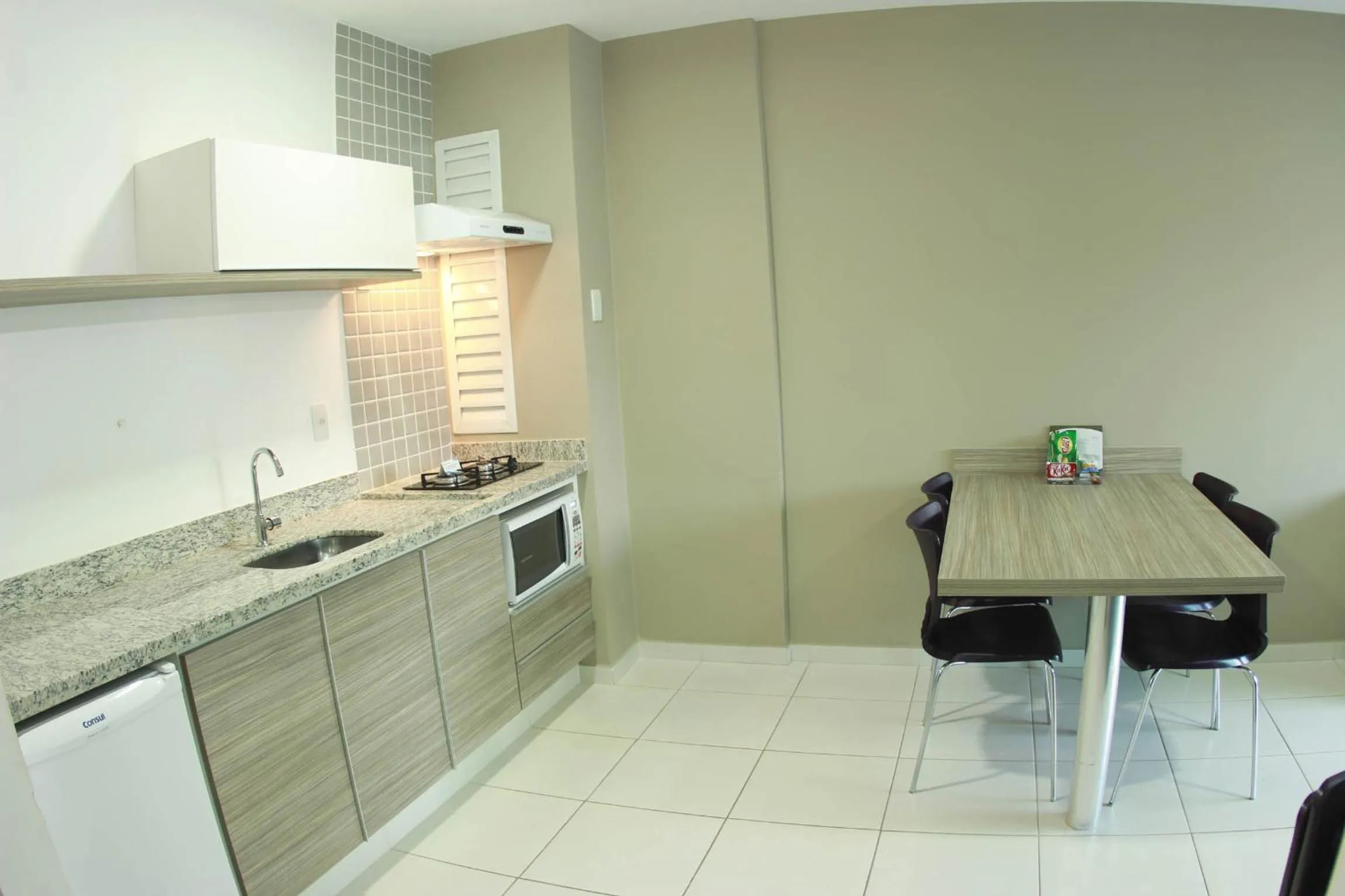 Kitchen or kitchenette in Riviera Park Hotel by WAM Experience
