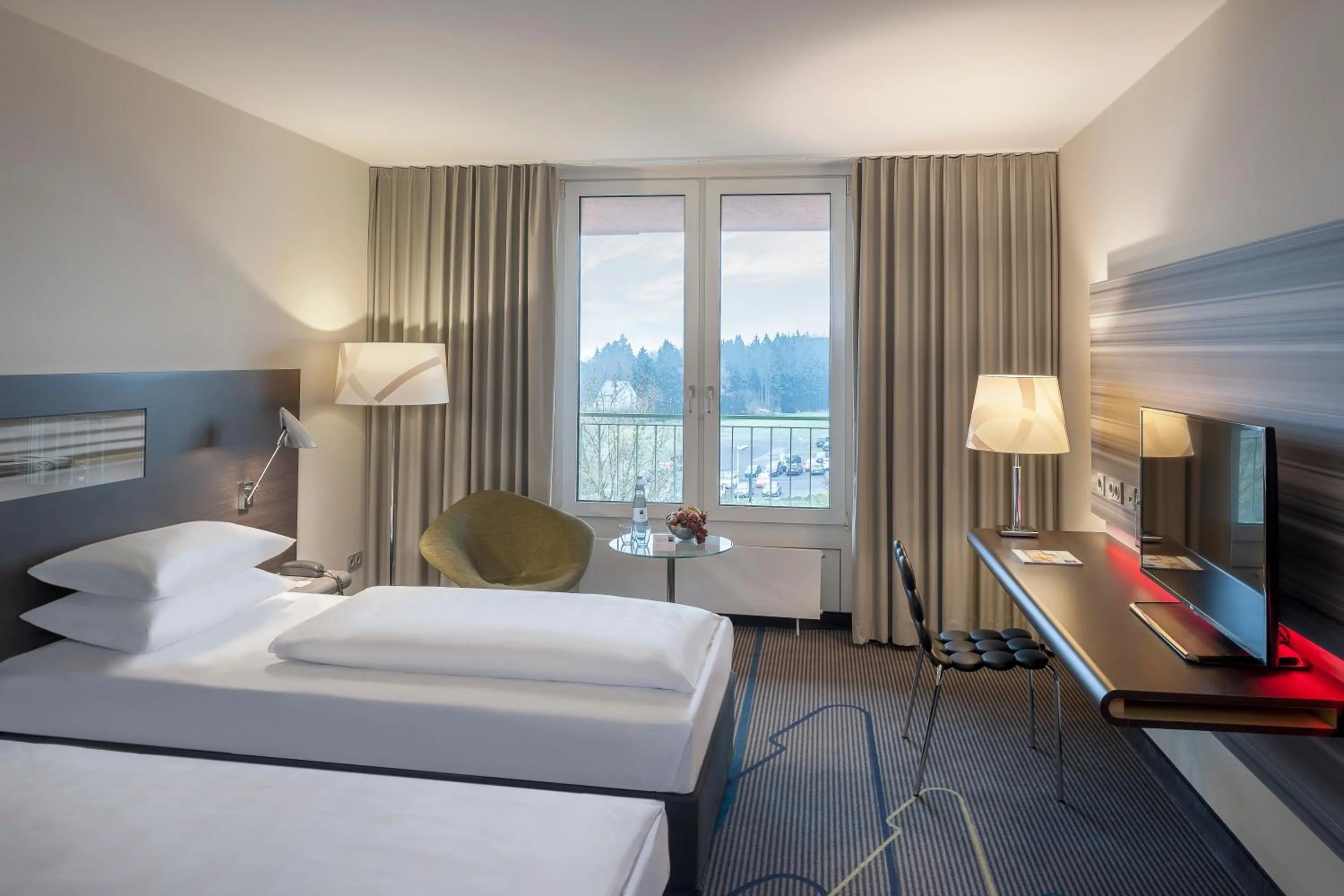 Photo of the whole room, Bed in Dorint Am Nürburgring Hocheifel