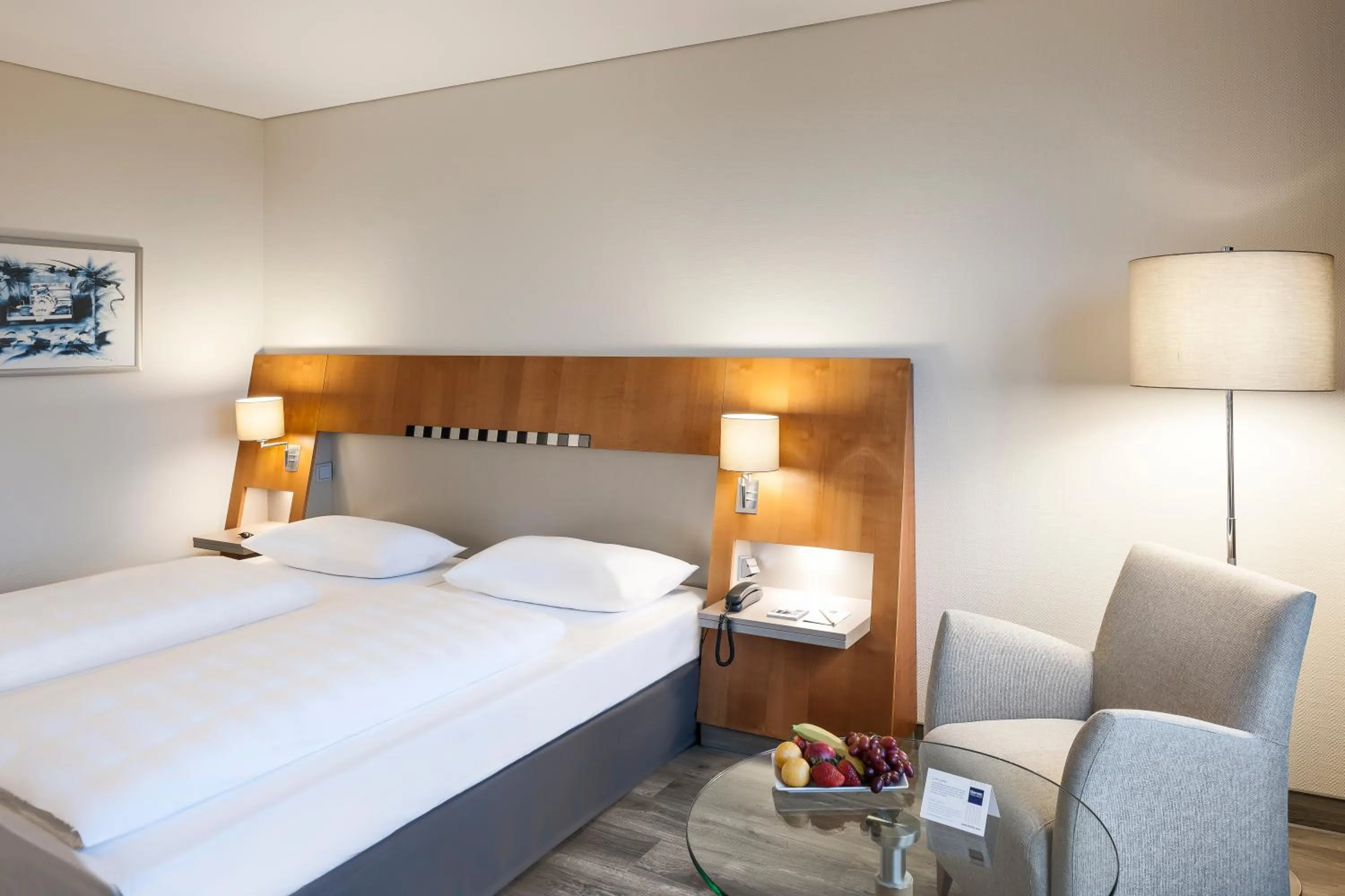 Photo of the whole room, Bed in Dorint Am Nürburgring Hocheifel