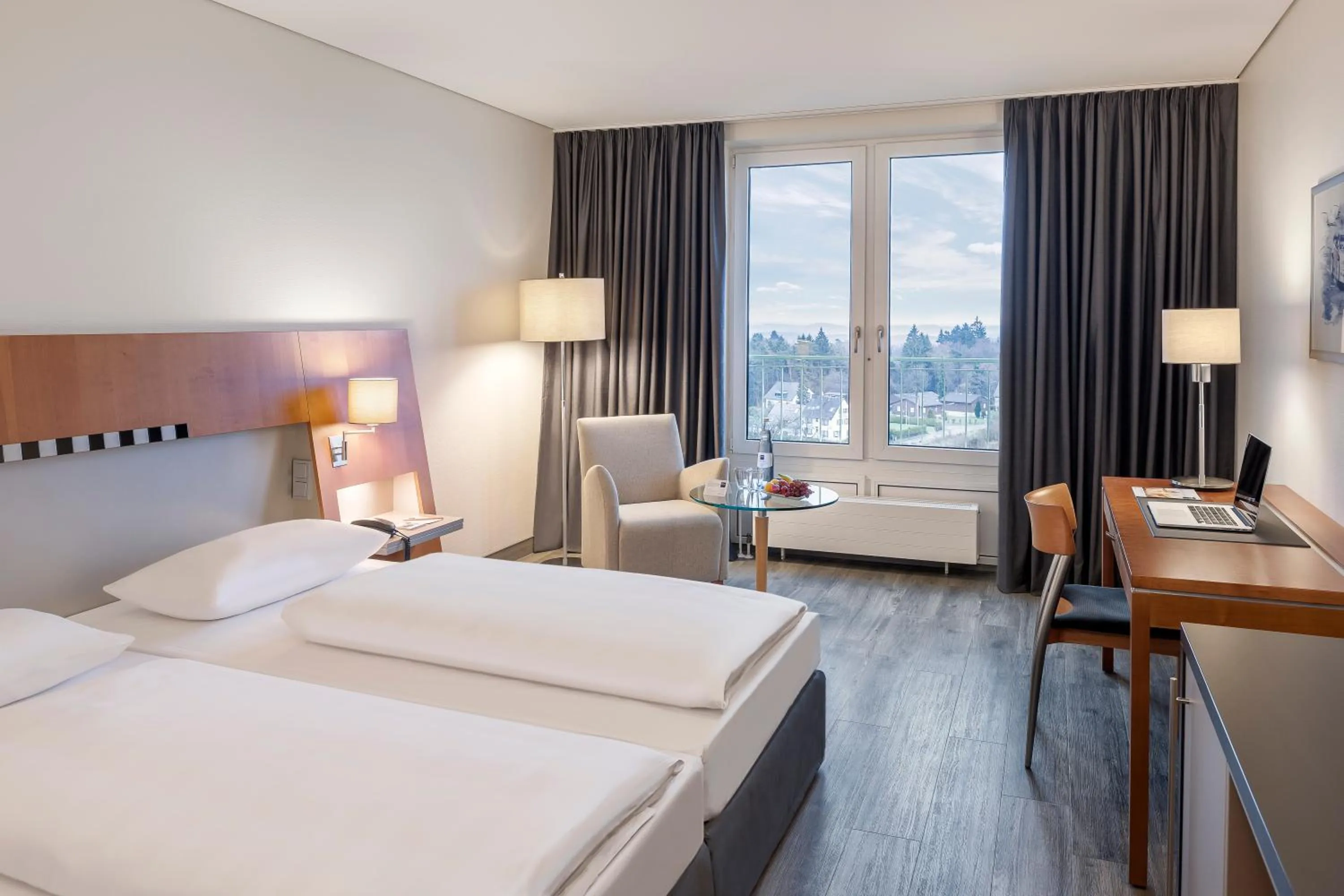 Photo of the whole room, Bed in Dorint Am Nürburgring Hocheifel