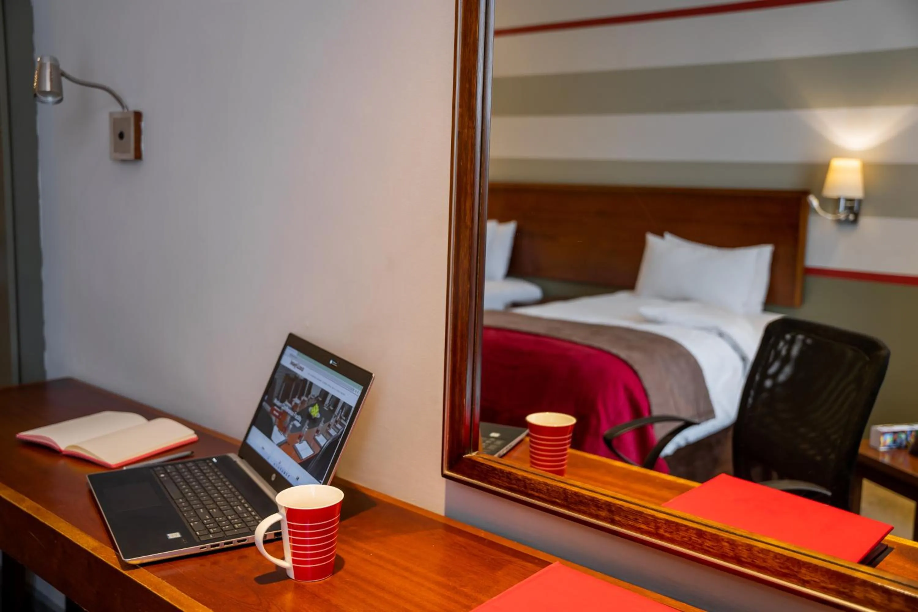 Photo of the whole room, Bed in Indaba Lodge Gaborone