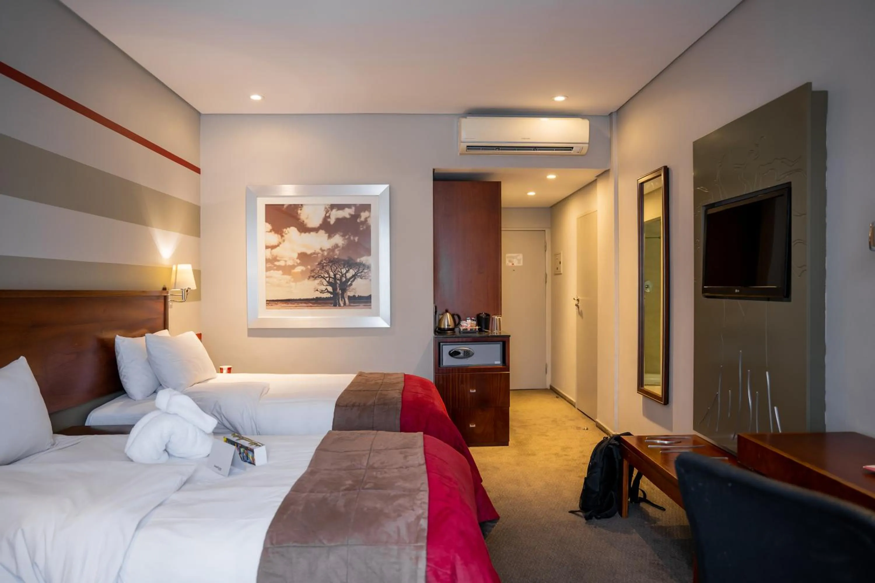 Photo of the whole room, Bed in Indaba Lodge Gaborone