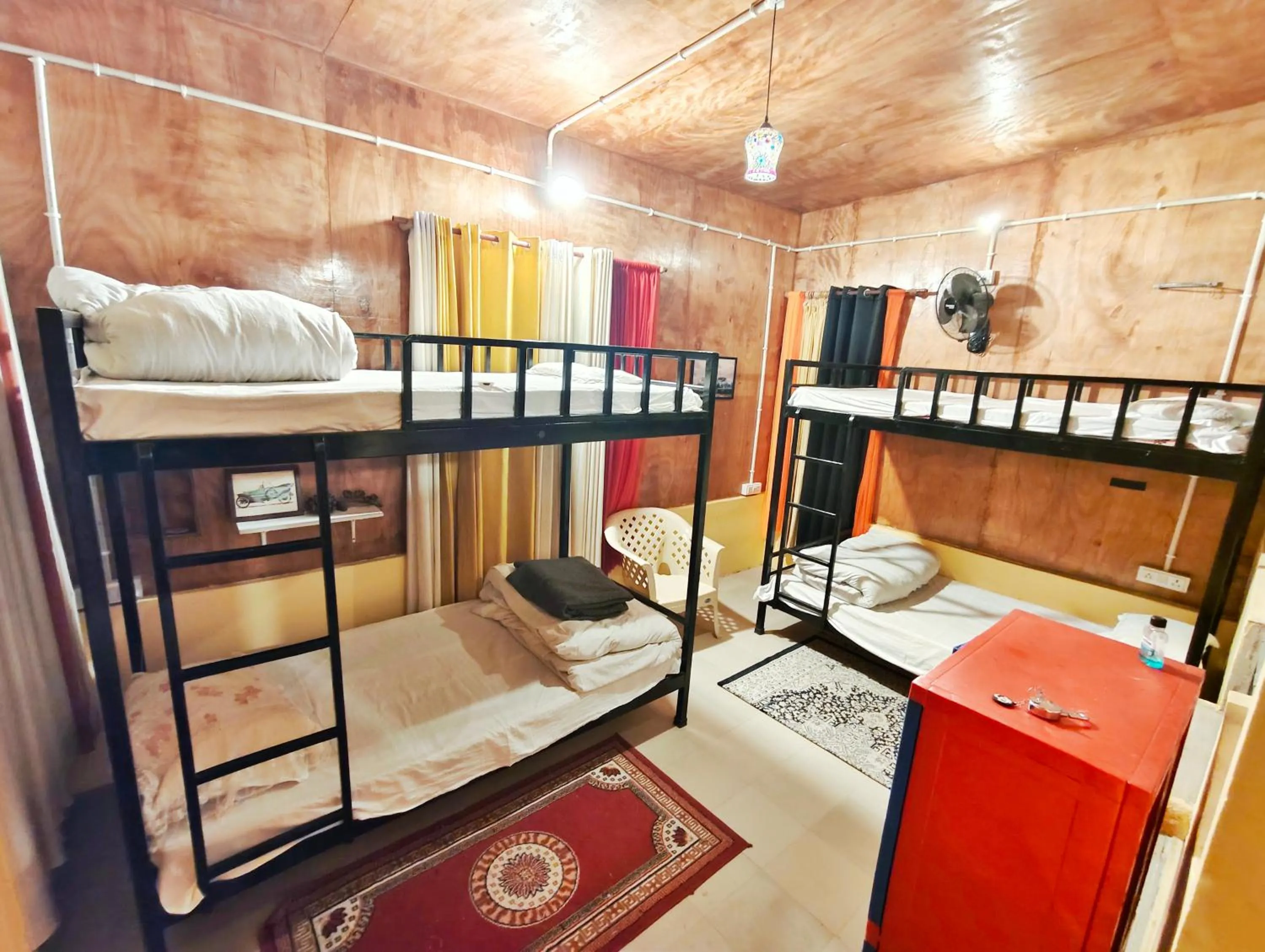 Photo of the whole room, Bed in Devi music ashram