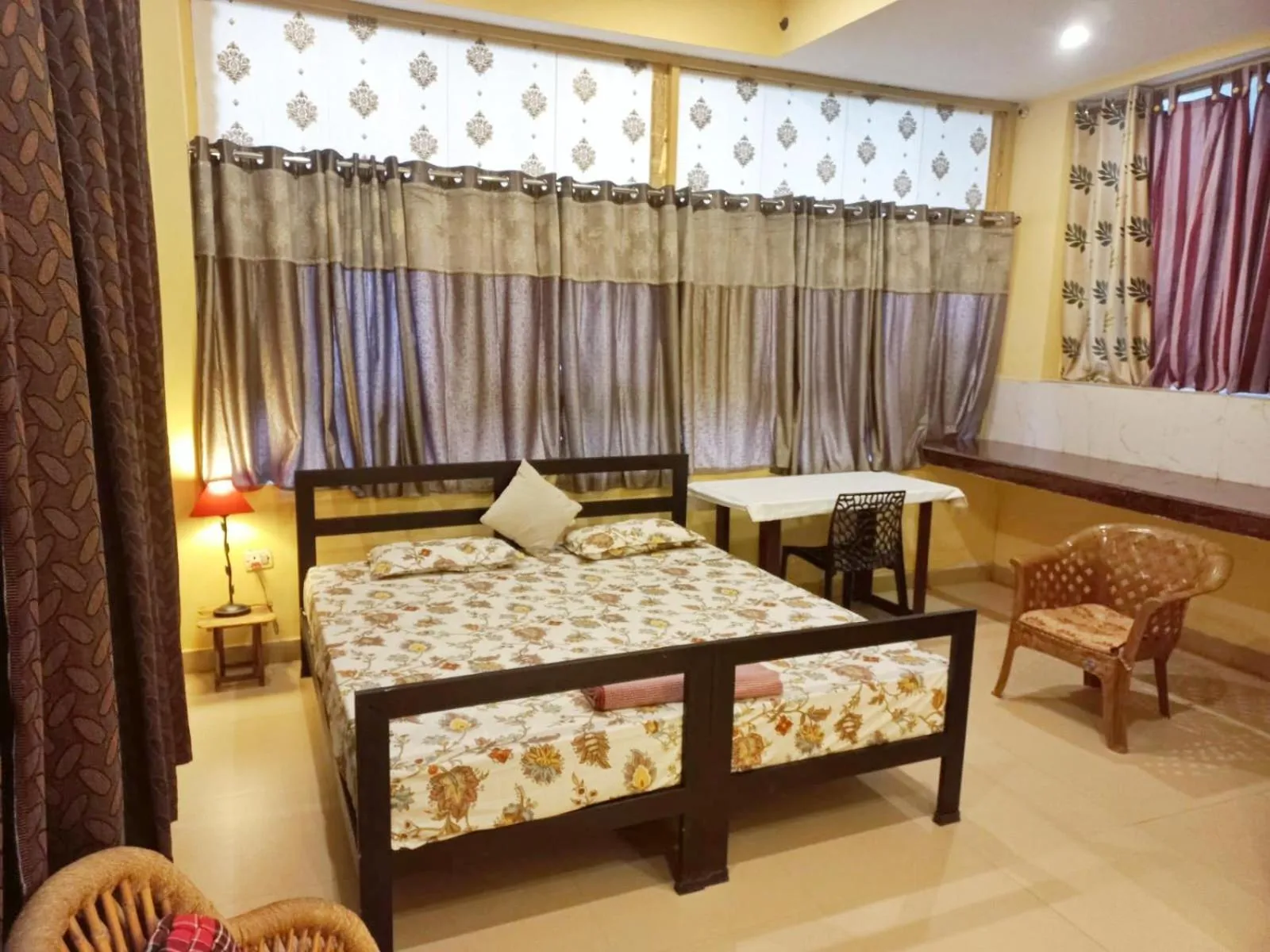 Photo of the whole room, Bed in Devi music ashram