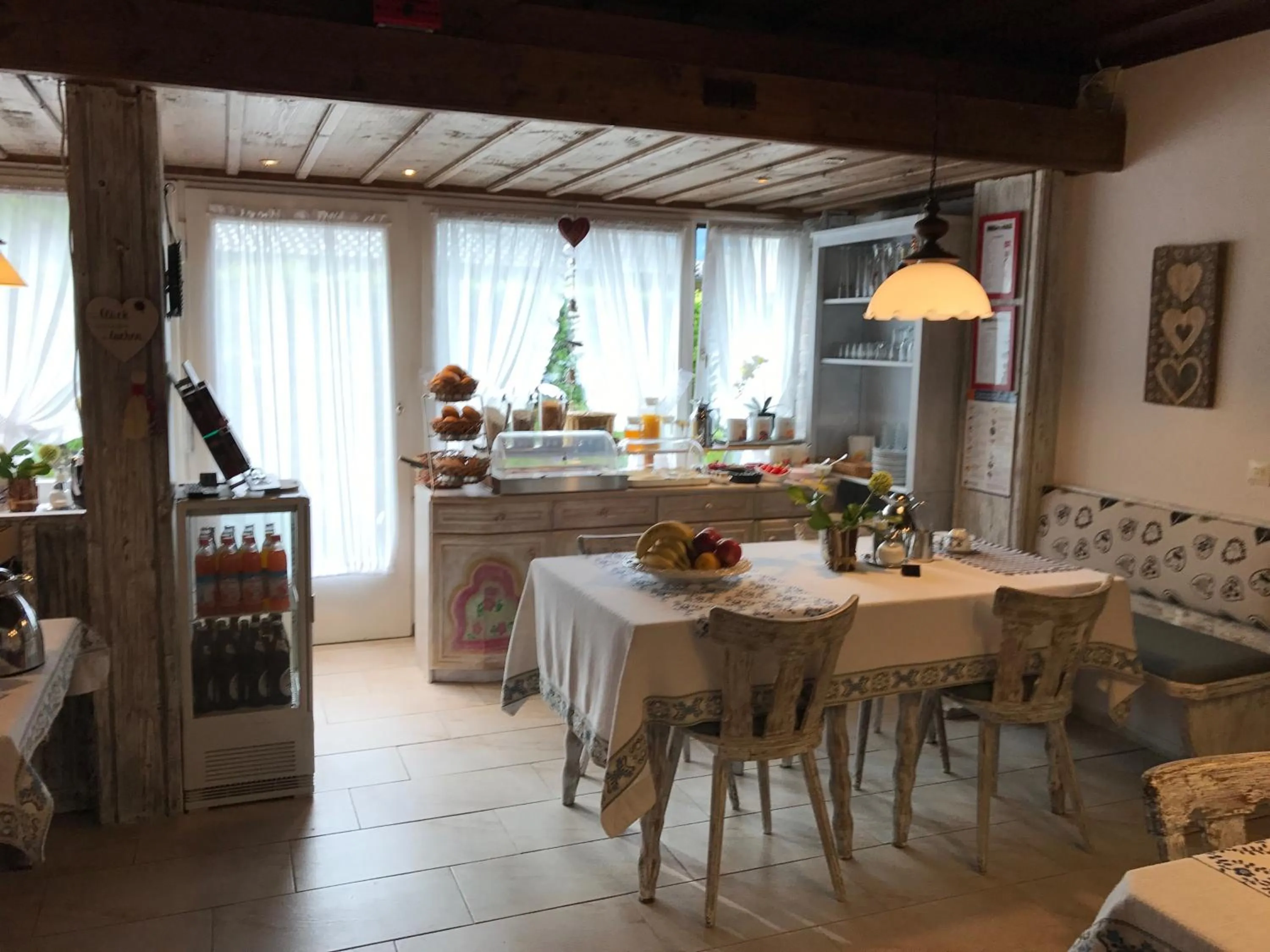 Dining area in Hotel Garni Haus Alpine - Chiemgau Karte inkl