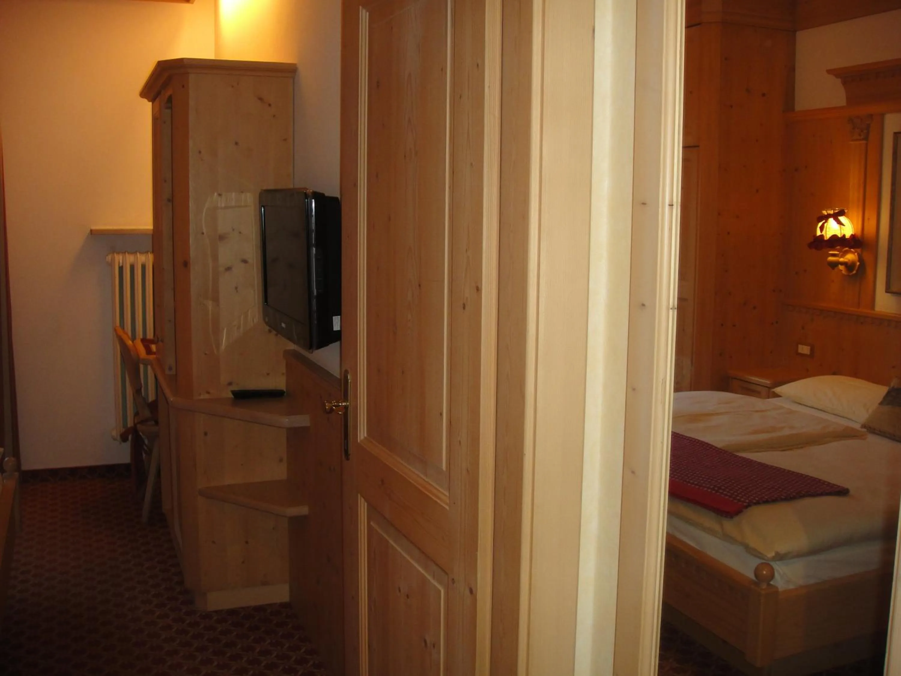 Photo of the whole room, Bed in Garni Toni