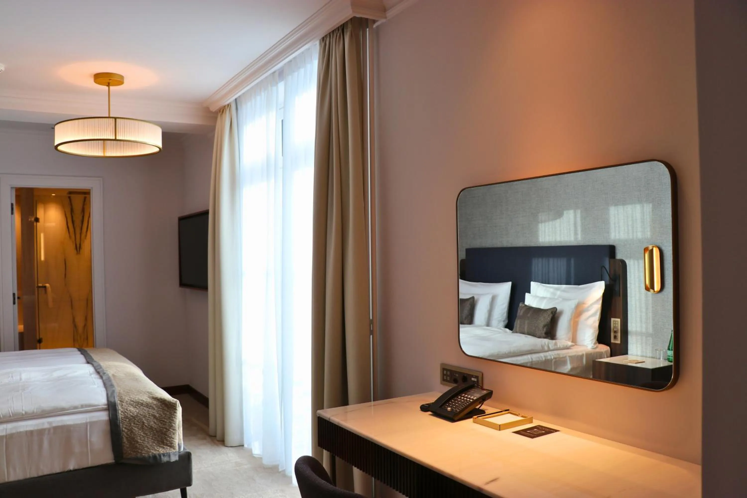 Bed in Grand Hotel des Bains Kempinski