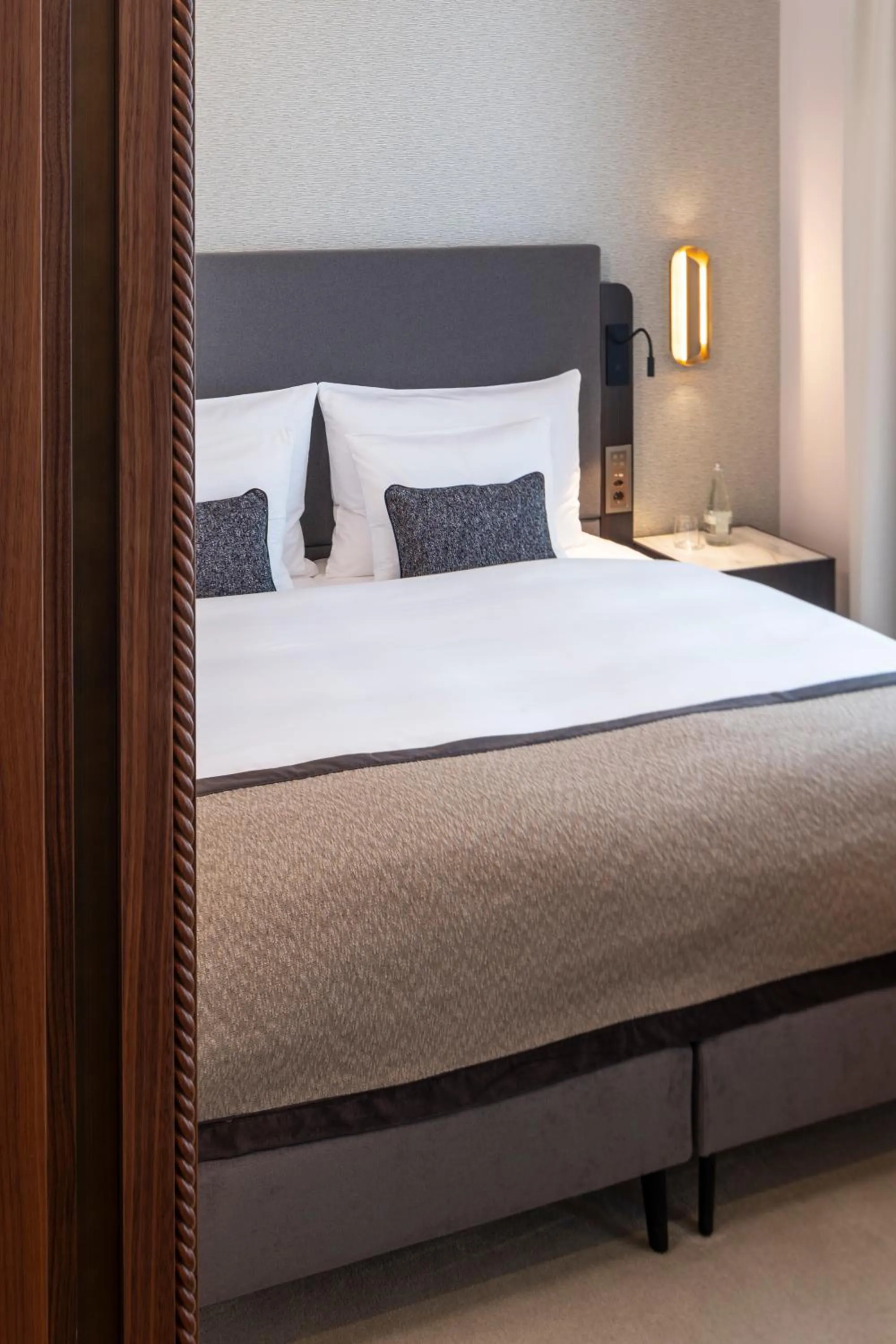 Bed in Grand Hotel des Bains Kempinski