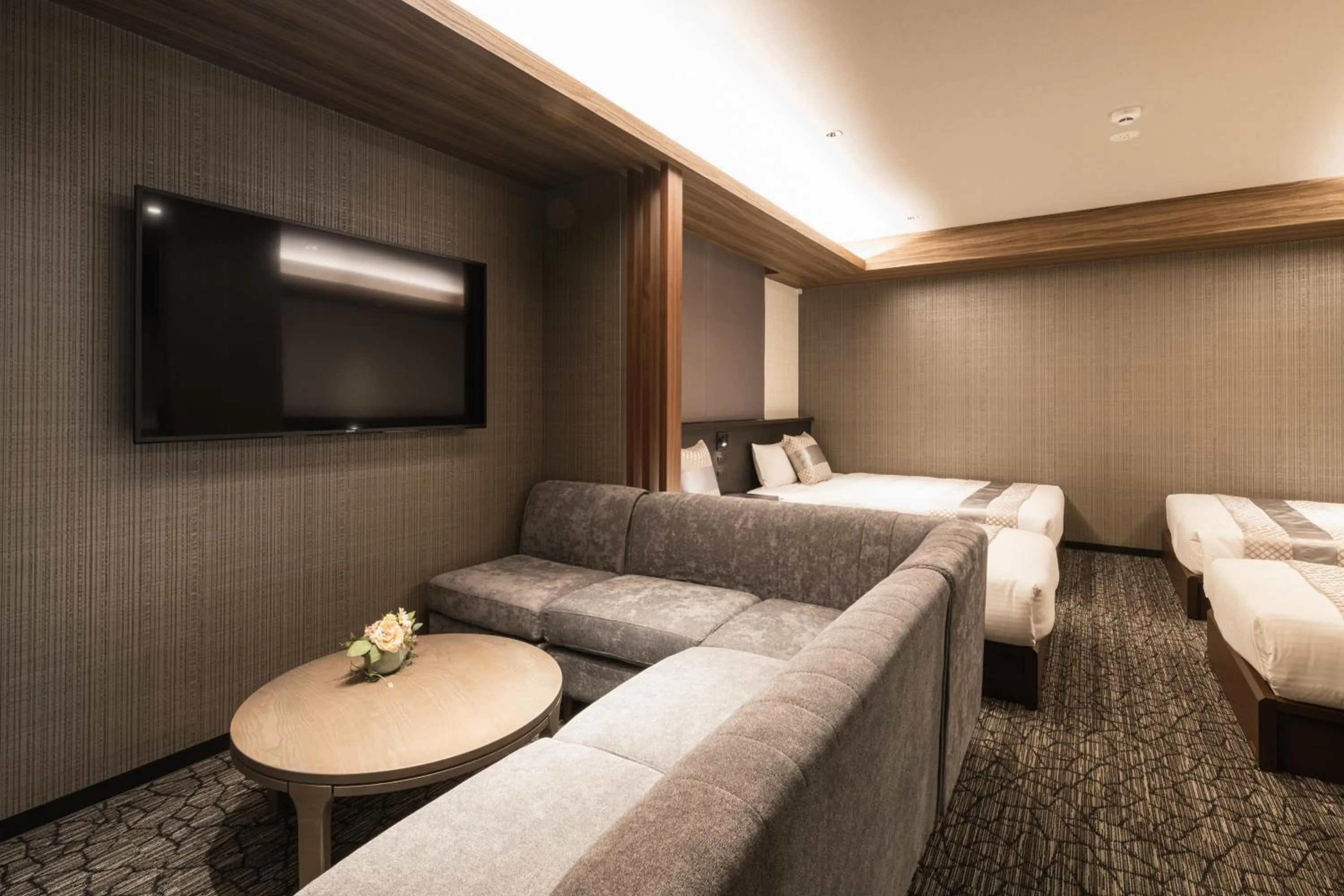 Photo of the whole room, Bed in GRAND BASE Kagoshima