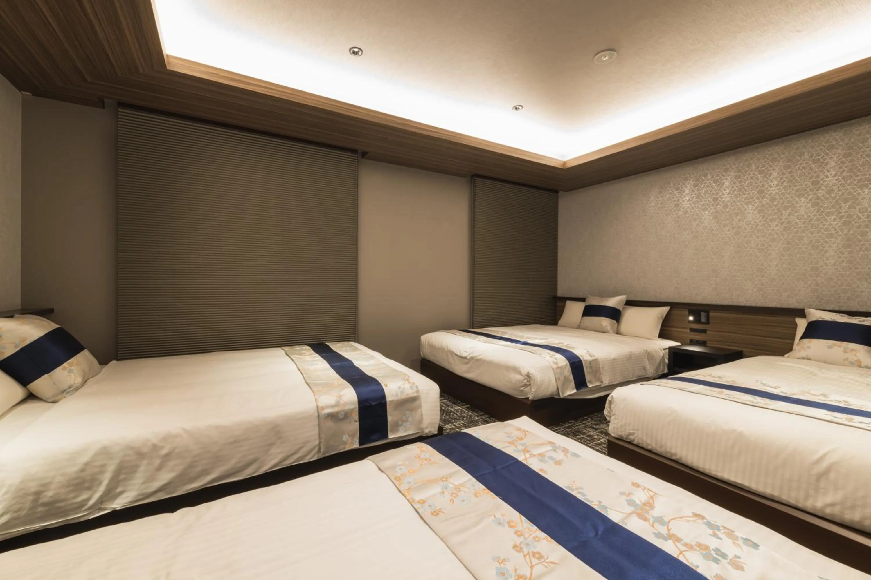 Bed in GRAND BASE Kagoshima Tenmonkan