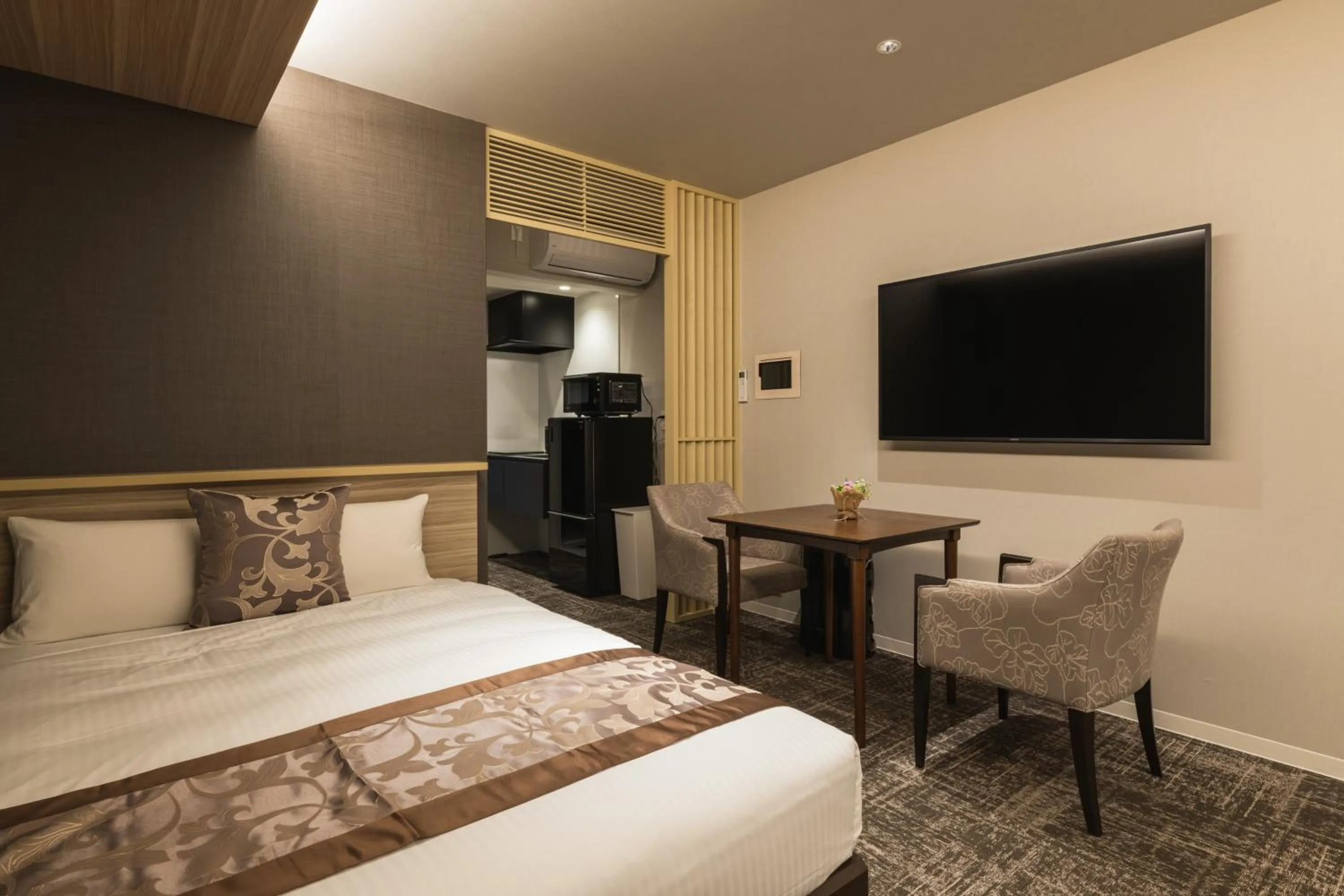 Photo of the whole room, Bed in GRAND BASE Kagoshima Tenmonkan