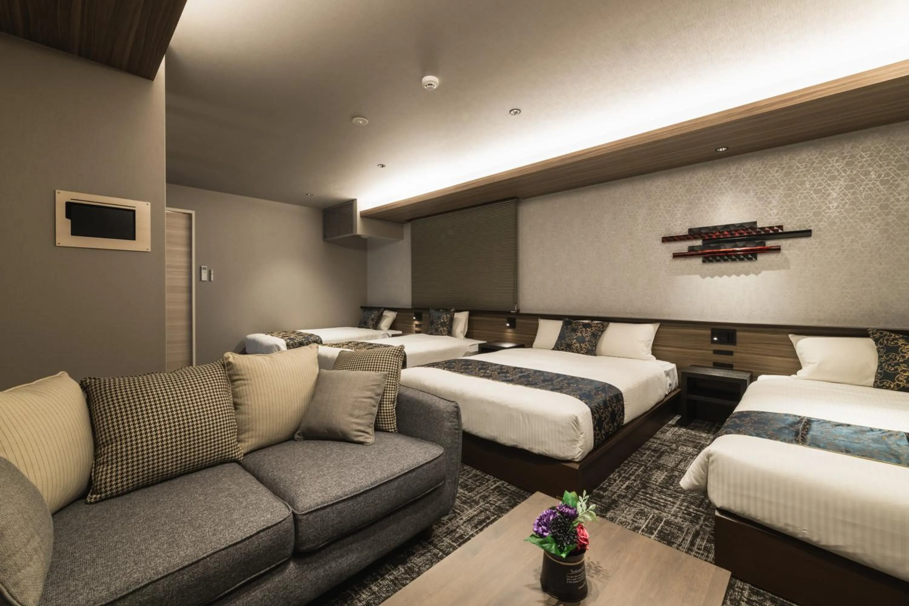 Bed in GRAND BASE Kagoshima Tenmonkan