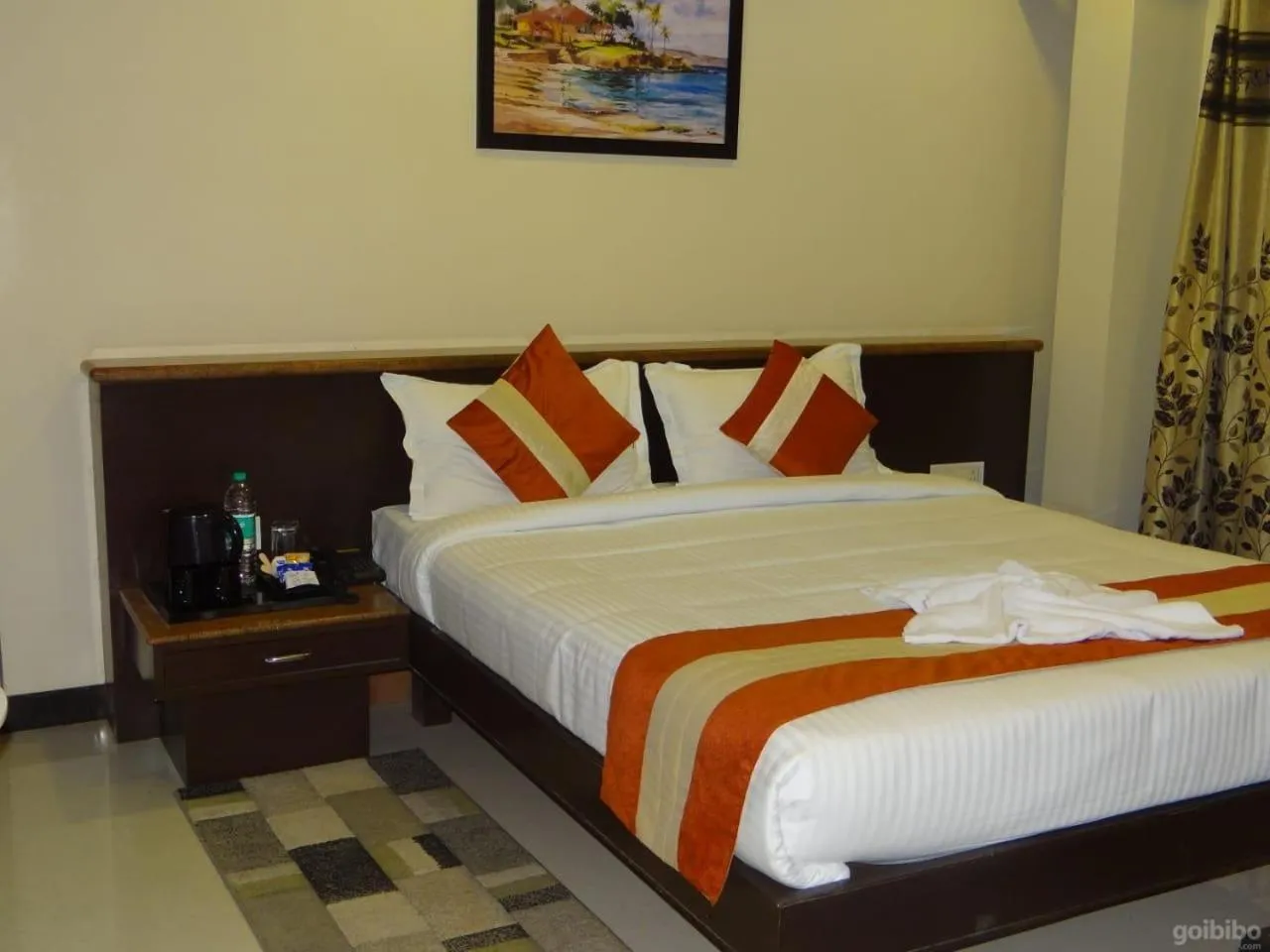 Bed in Hotel Rose Mansion Manyata Tech Park