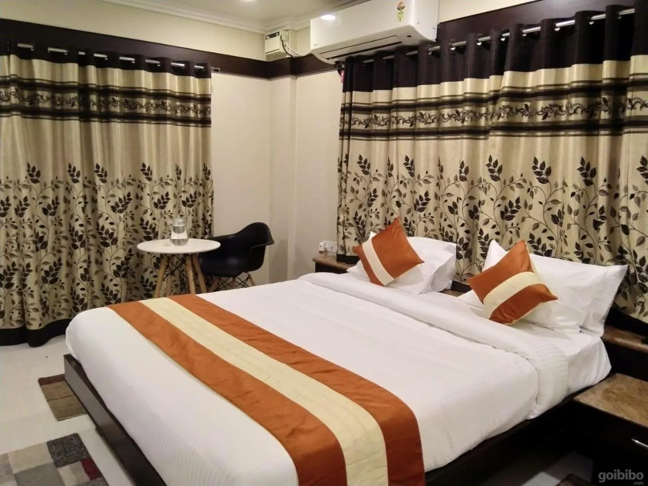 Bed in Hotel Rose Mansion Manyata Tech Park