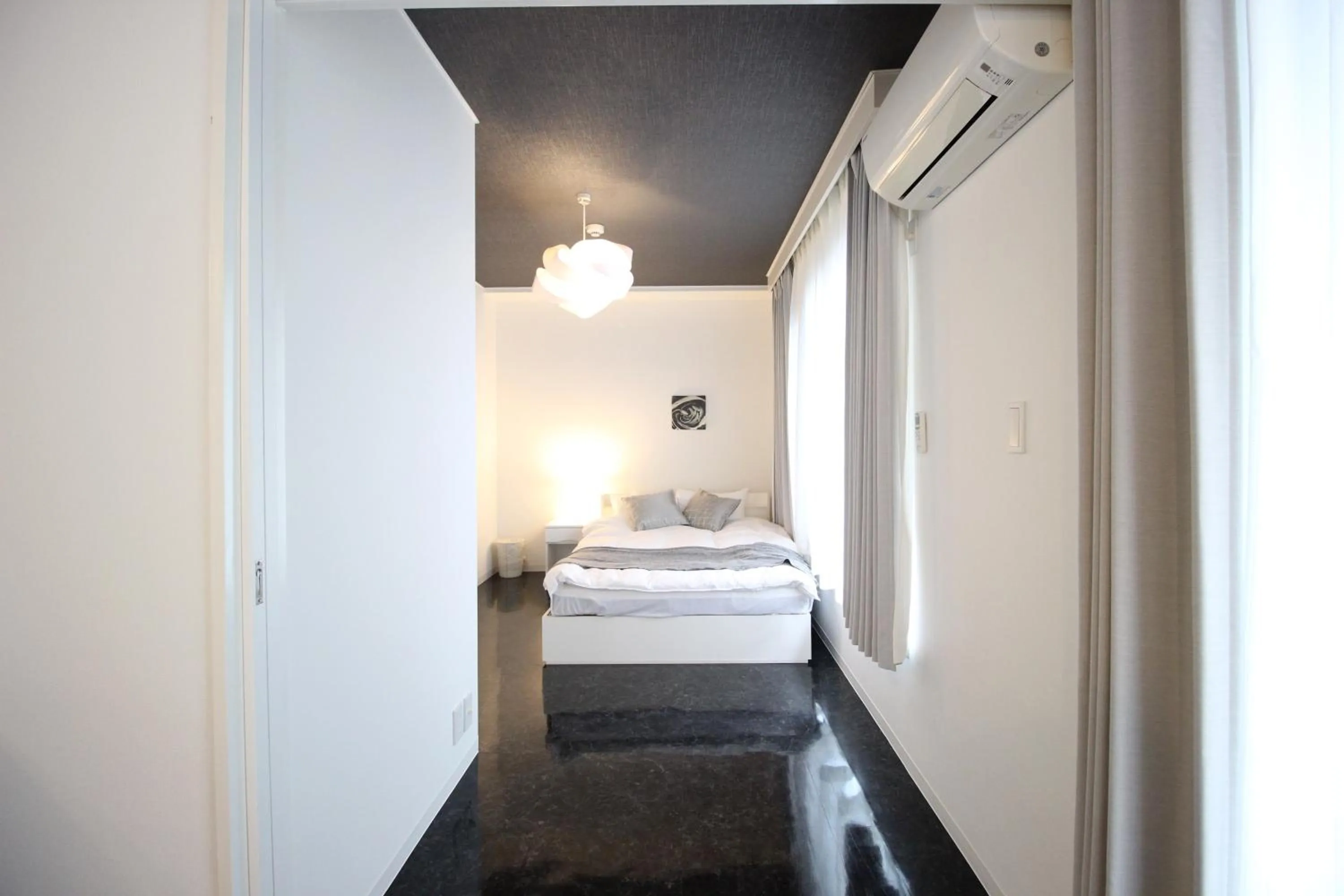 Bedroom, Bed in Atrium Deluxe Apartments Osaka - Self Check-In Only