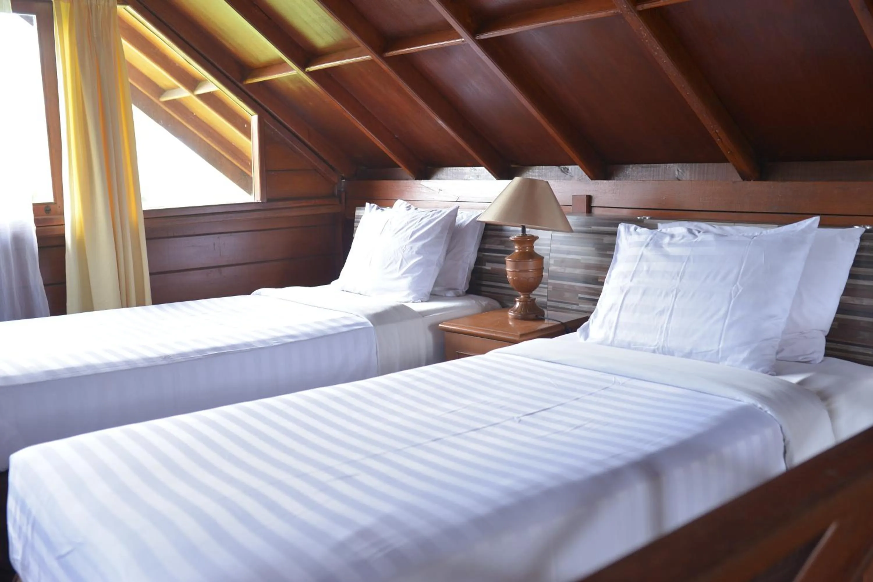 Property building, Bed in Citra Cikopo Hotel & Family Cottages