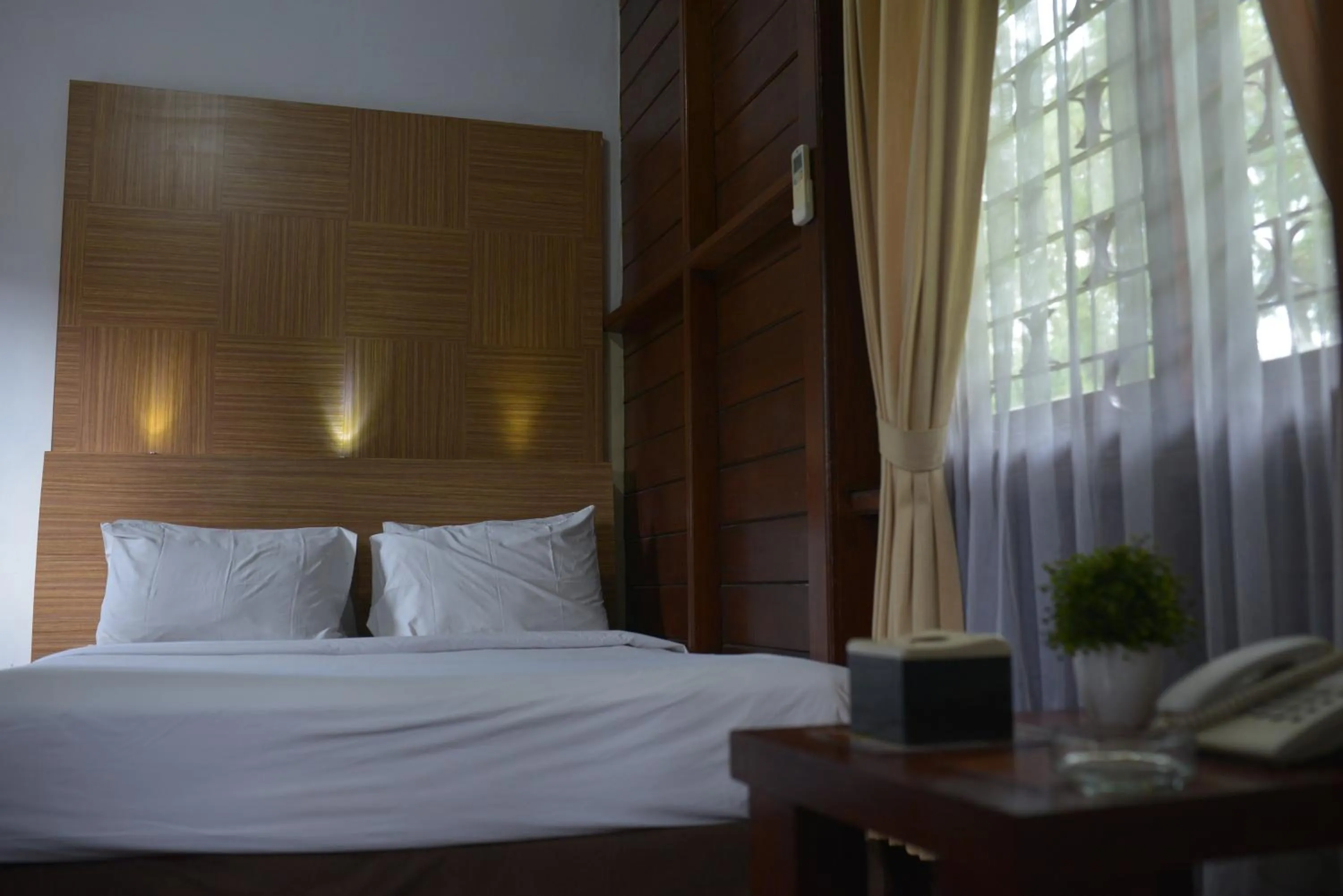 Property building, Bed in Citra Cikopo Hotel & Family Cottages