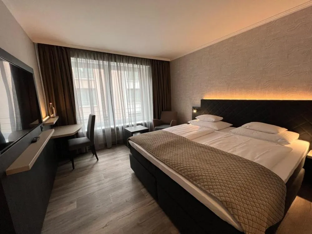 Photo of the whole room, Bed in Ringhotel Niedersachsen