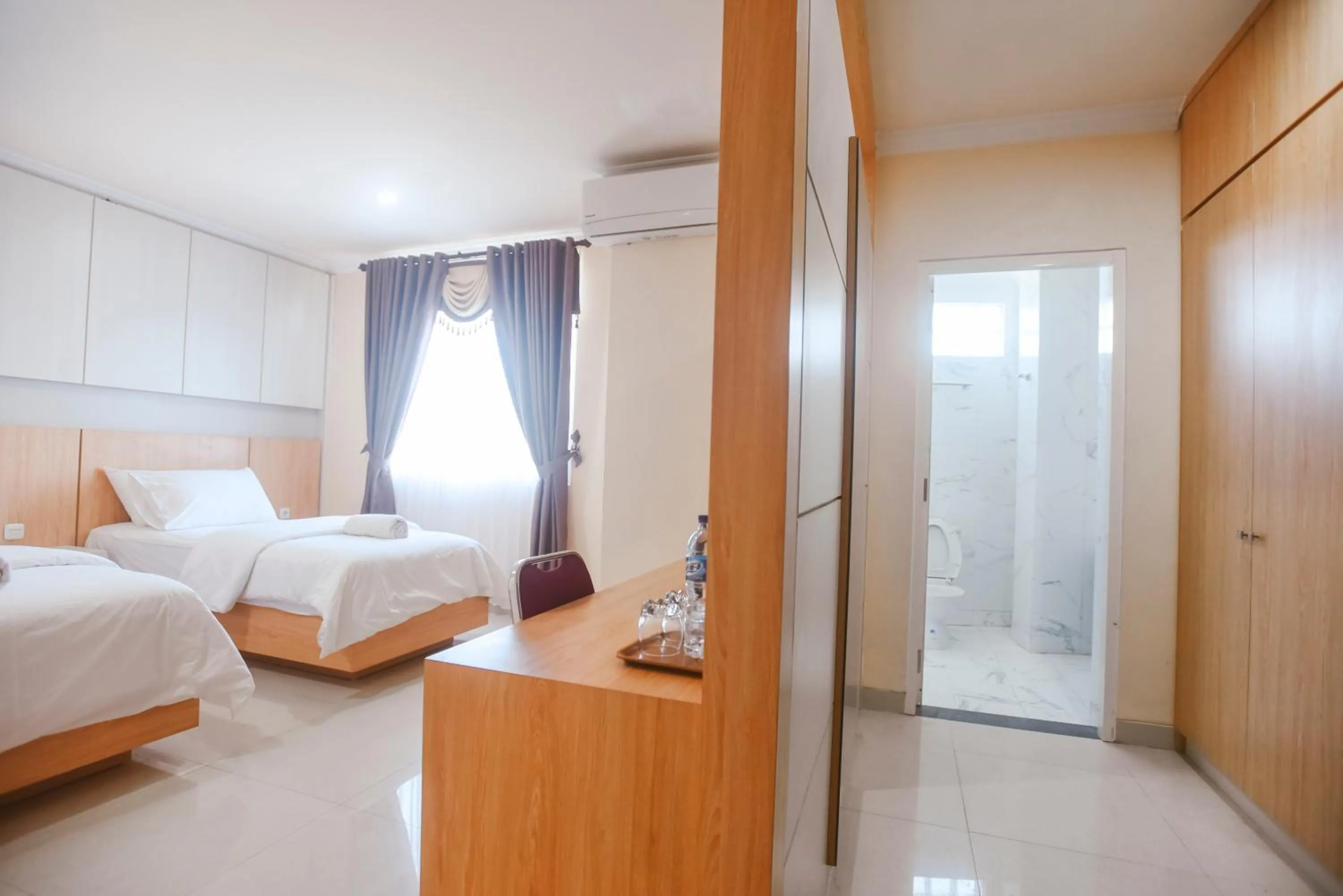 Bed in CHRYSANT HOTEL & RESORT