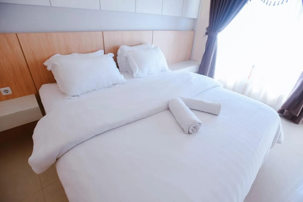 Bed in CHRYSANT HOTEL & RESORT