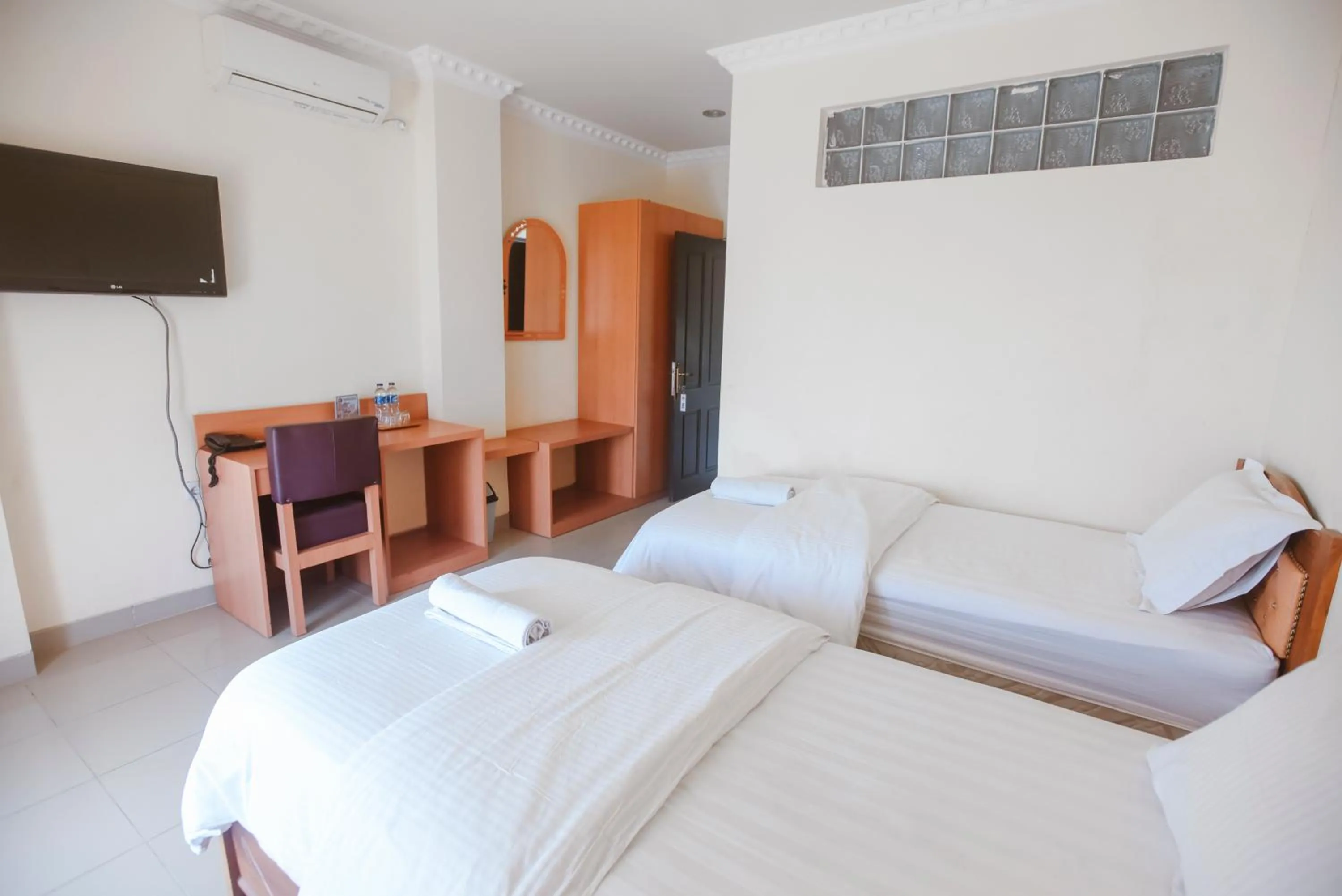 Communal lounge/ TV room, Bed in CHRYSANT HOTEL & RESORT