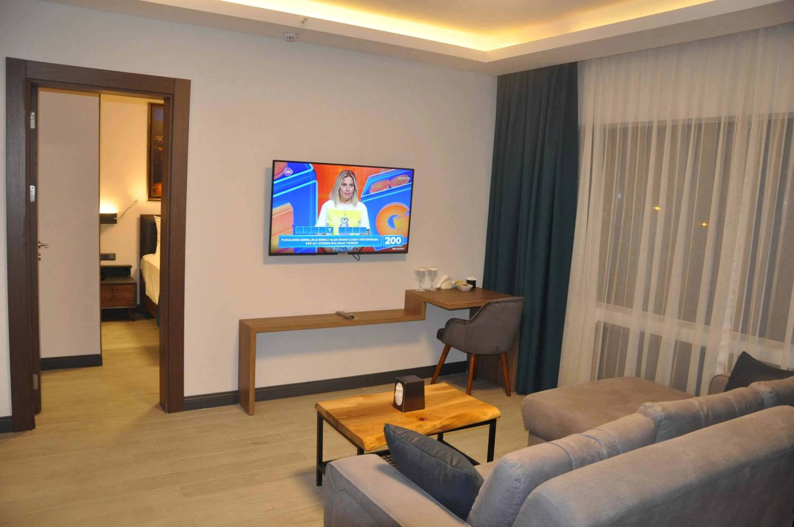 Communal lounge/ TV room in GOLAZ SUİT OTEL