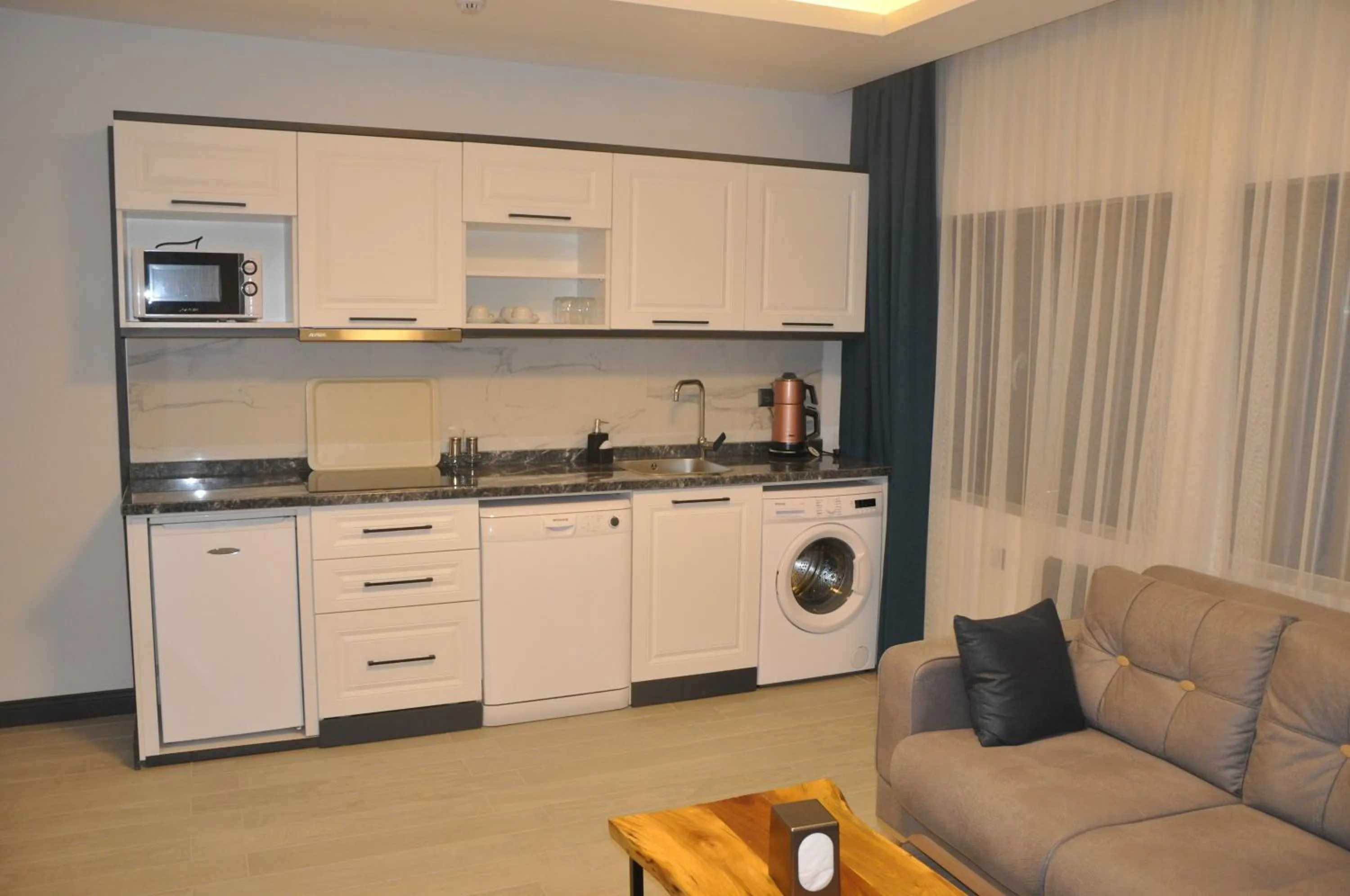 Kitchen or kitchenette in GOLAZ SUİT OTEL