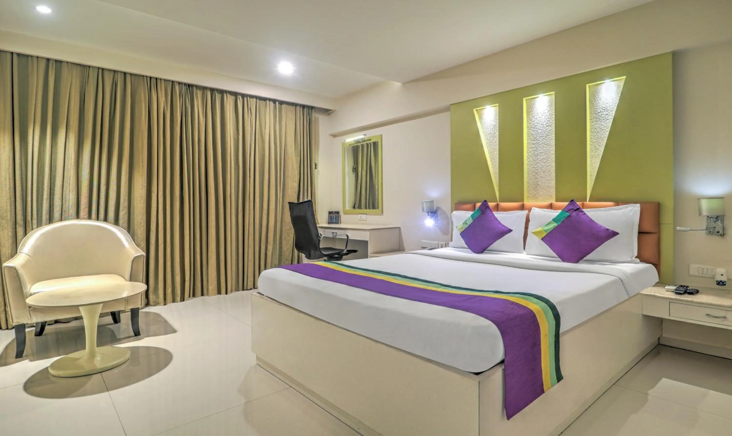 Bedroom, Bed in Treebo Premium Metropolis