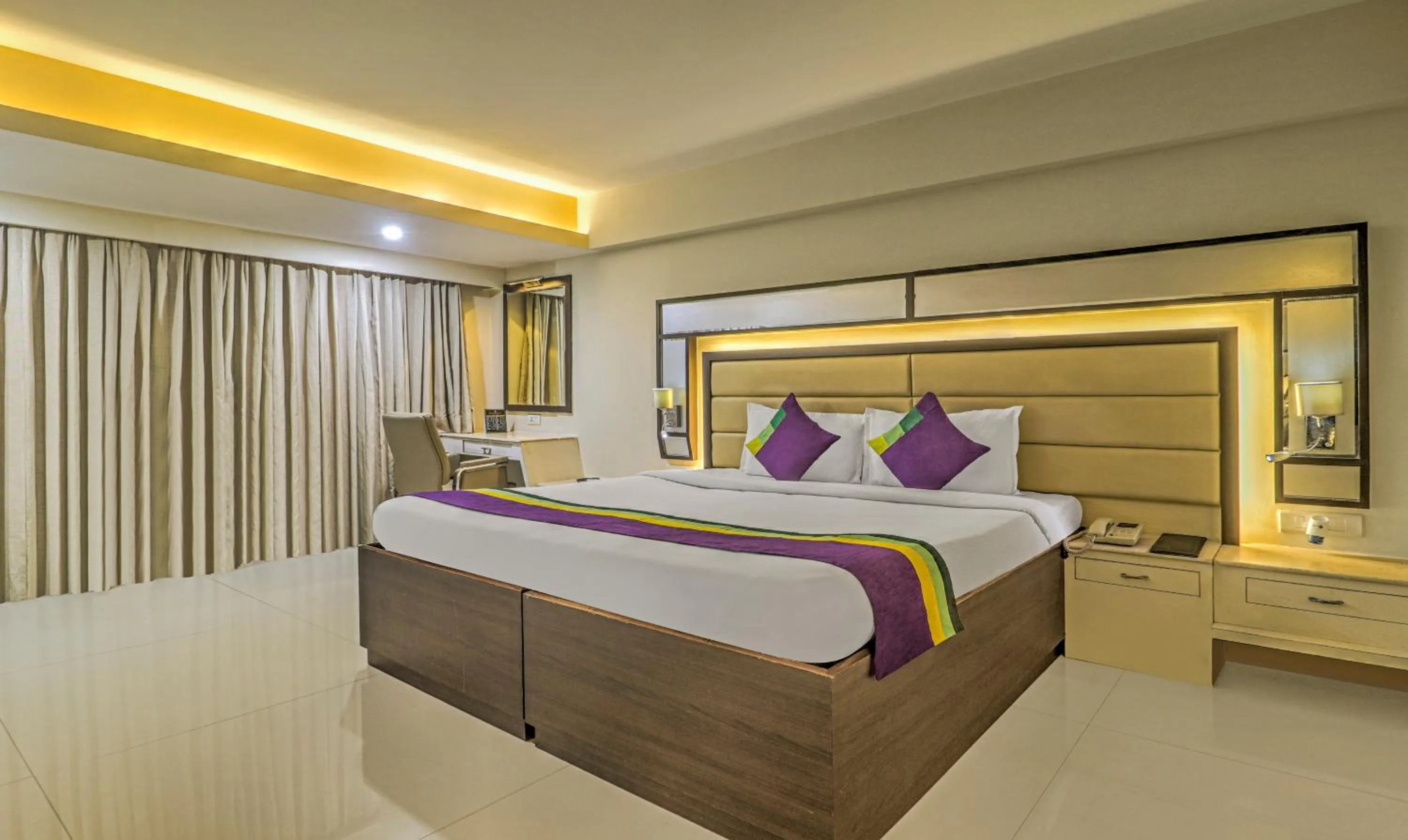 Bedroom, Bed in Treebo Premium Metropolis