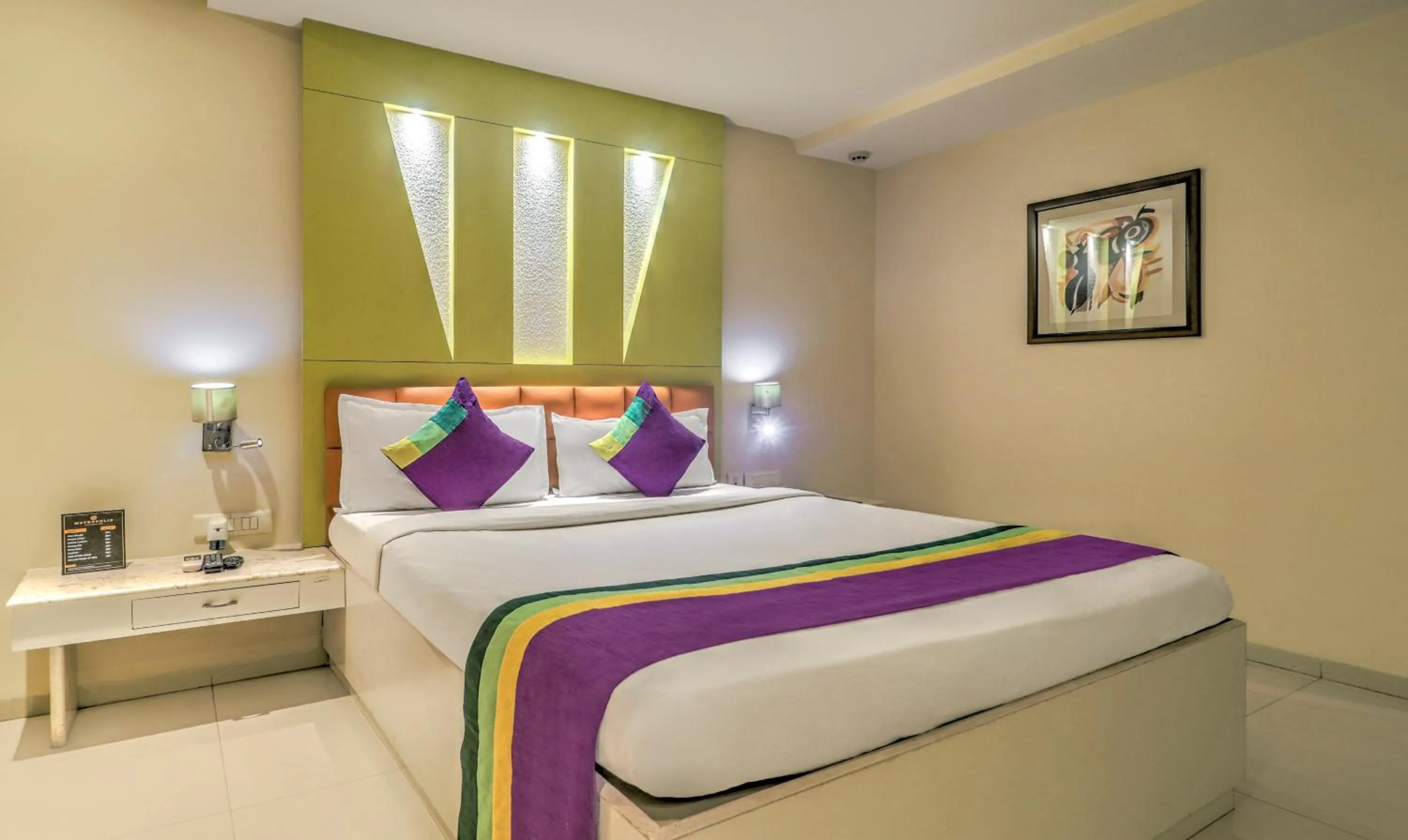 Bedroom, Bed in Treebo Premium Metropolis