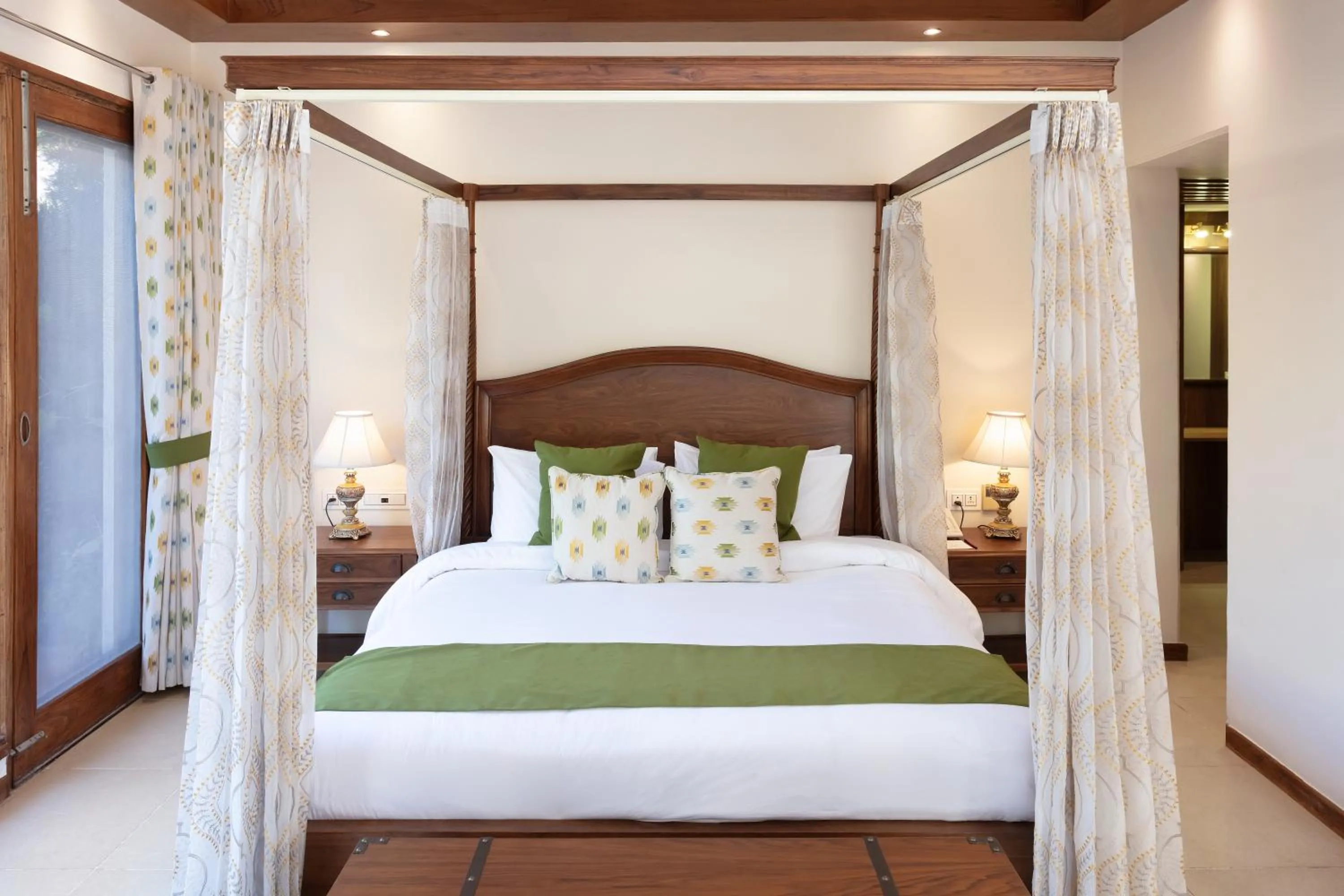 Bed in Suryavilas Luxury Resort & Spa