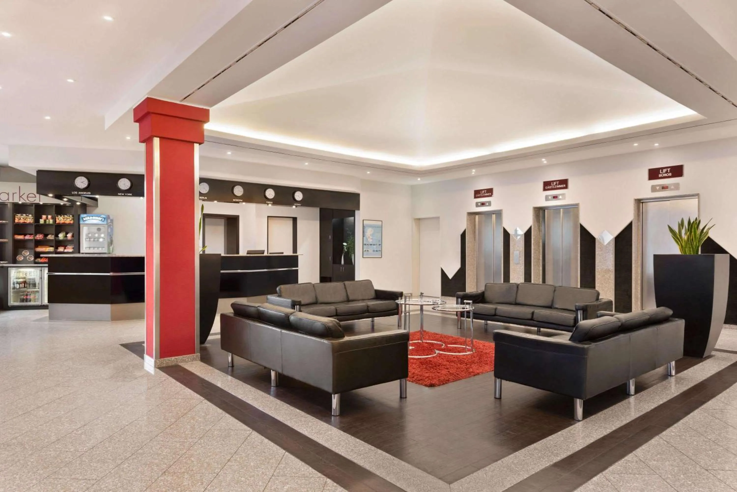 Lobby or reception in Ramada by Wyndham Bottrop City