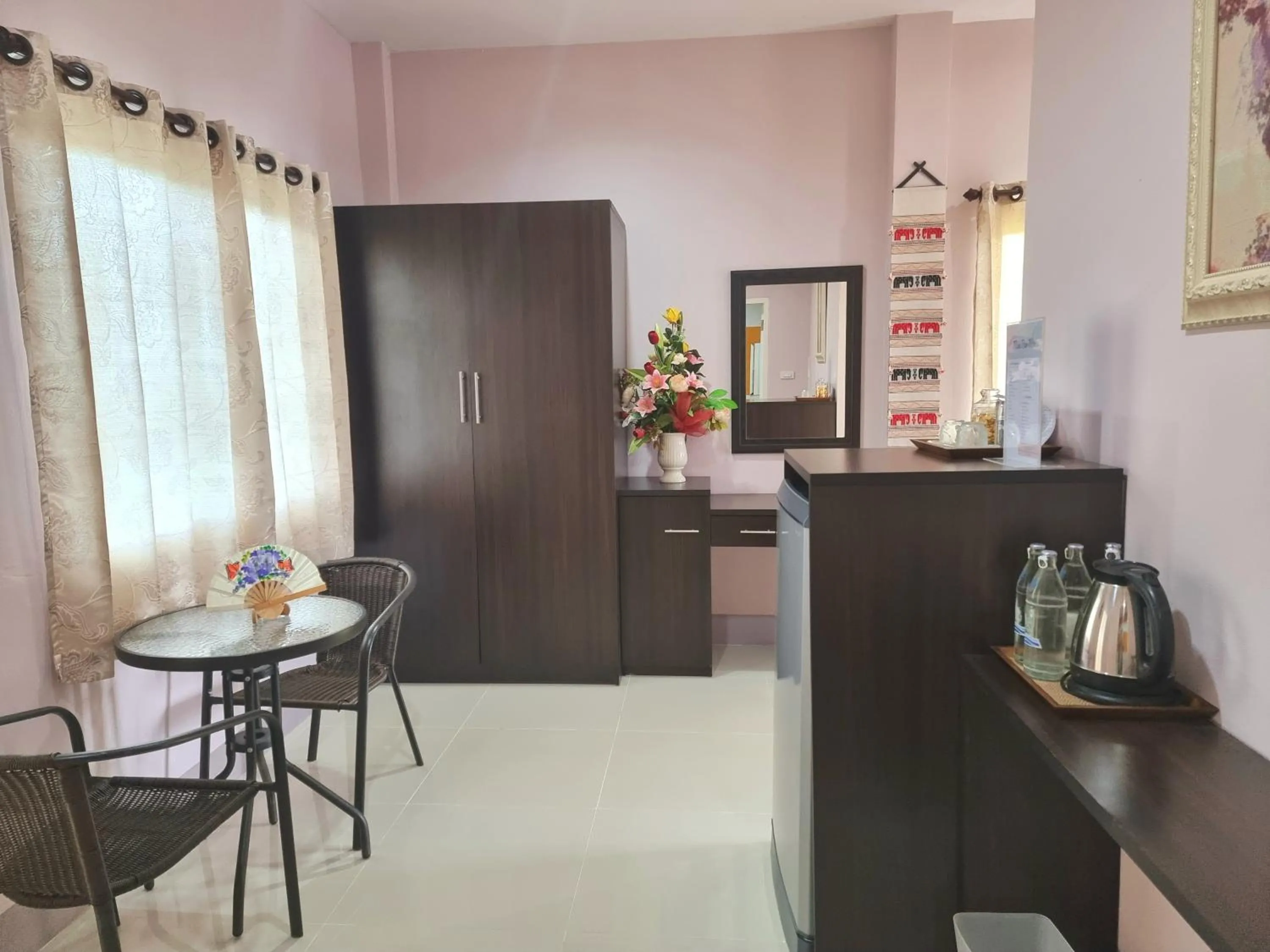 Bedroom in Chiangkham Grand Villa - SHA Certified