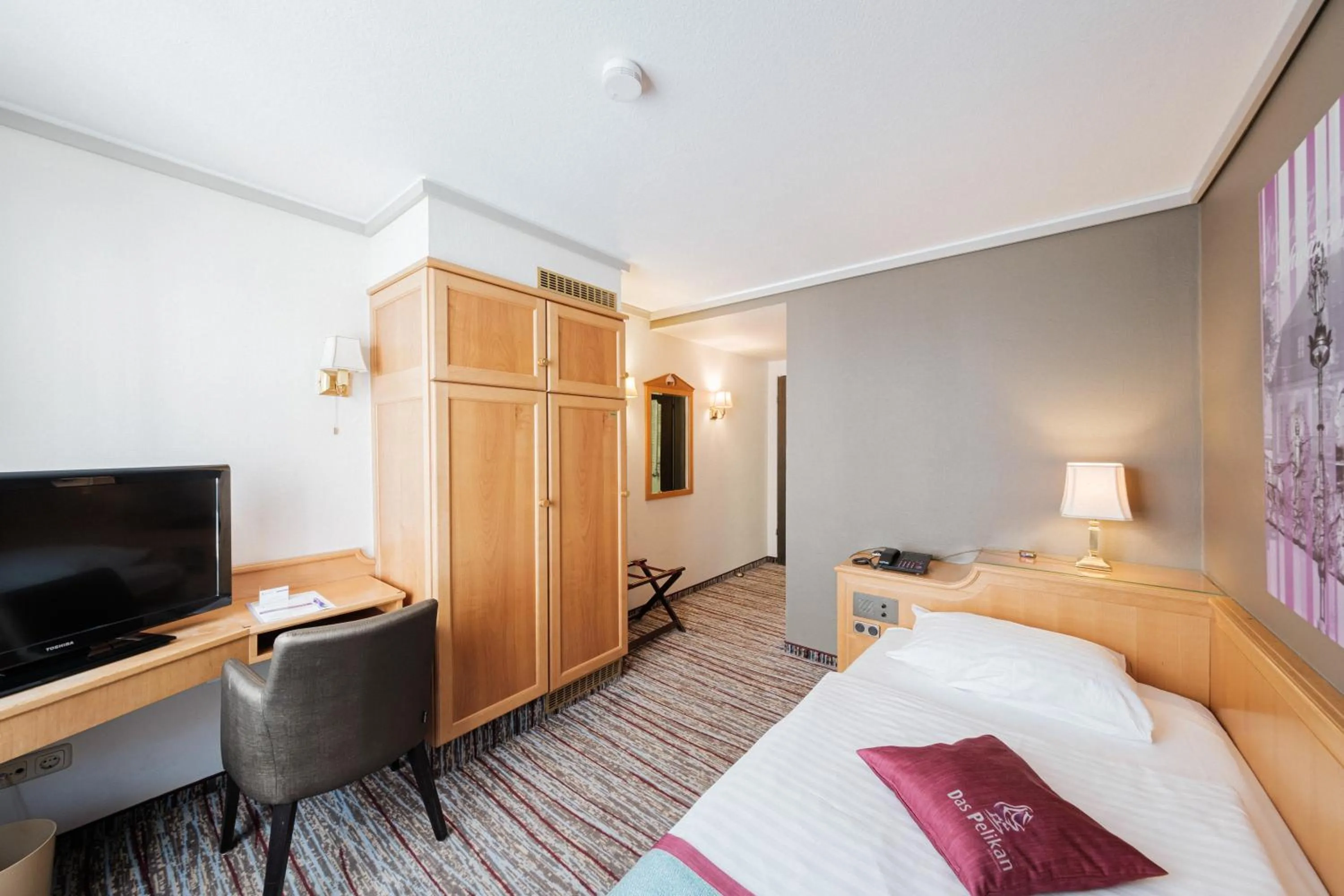 Bed in Hotel Pelikan