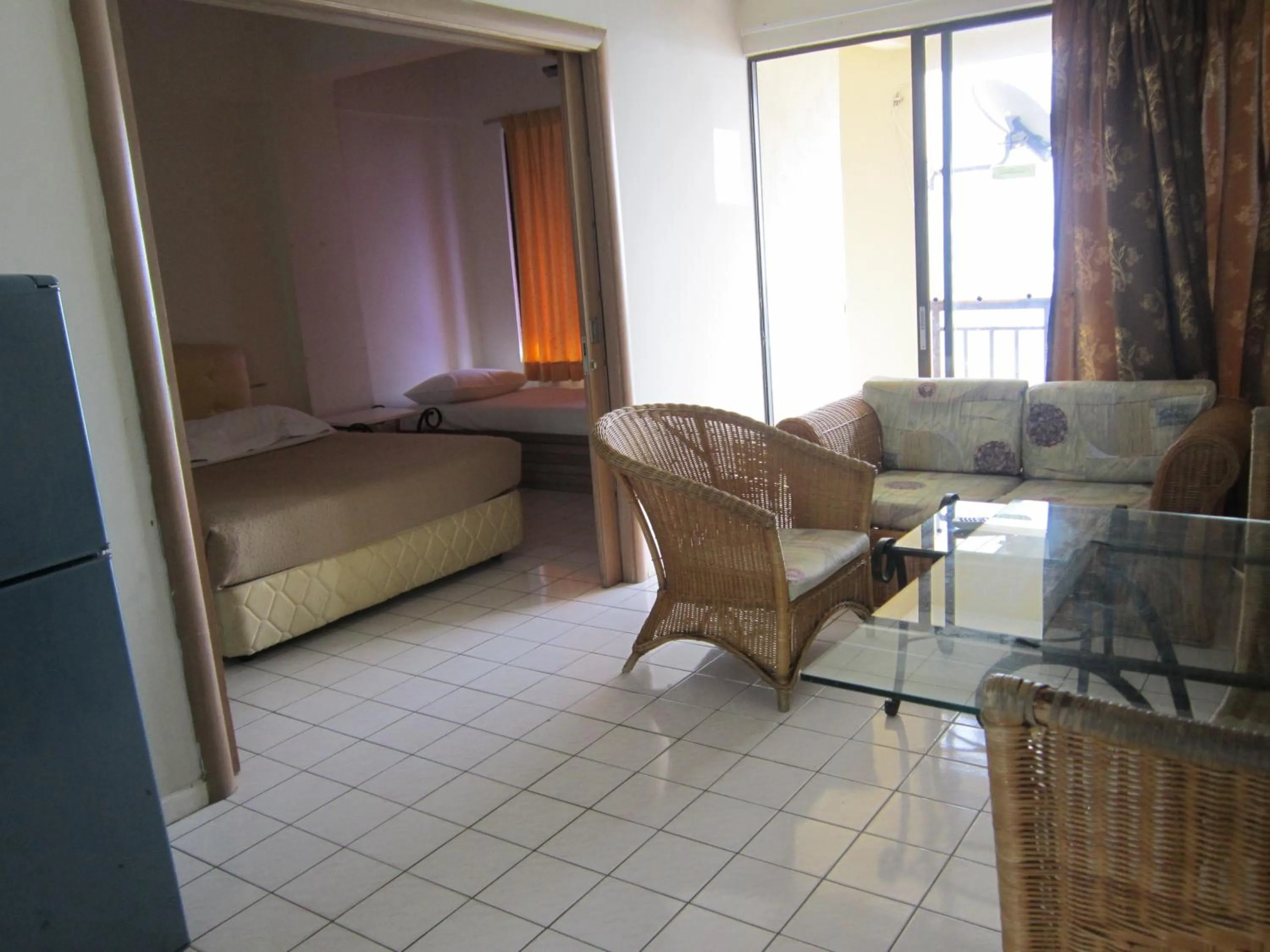 Bed in Paradise Lagoon Apartment