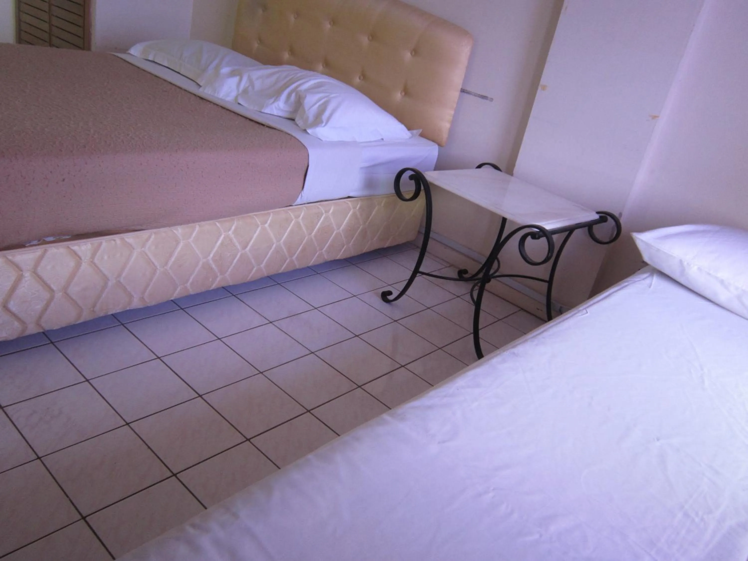 Bed in Paradise Lagoon Apartment