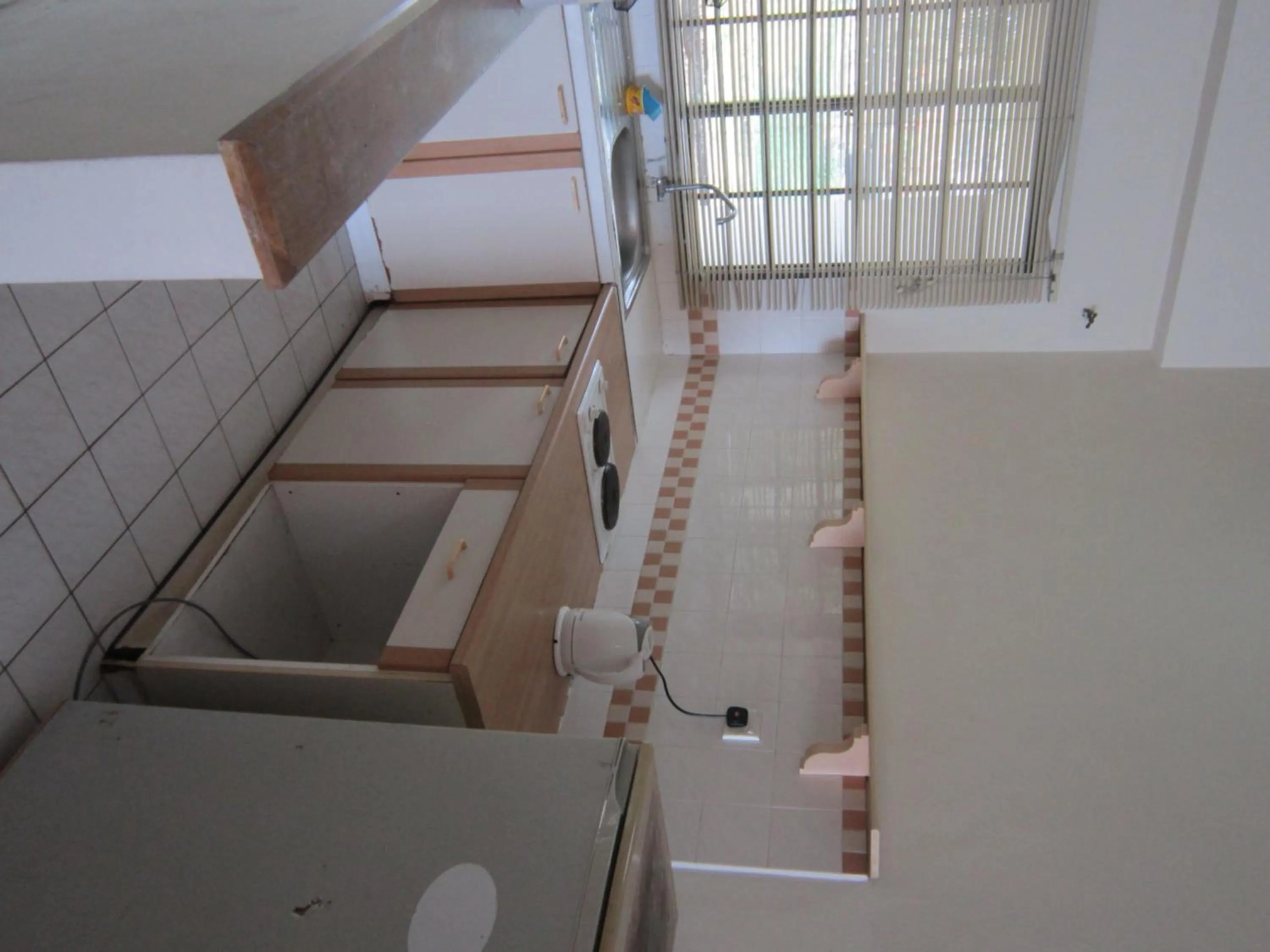 Kitchen or kitchenette in Paradise Lagoon Apartment