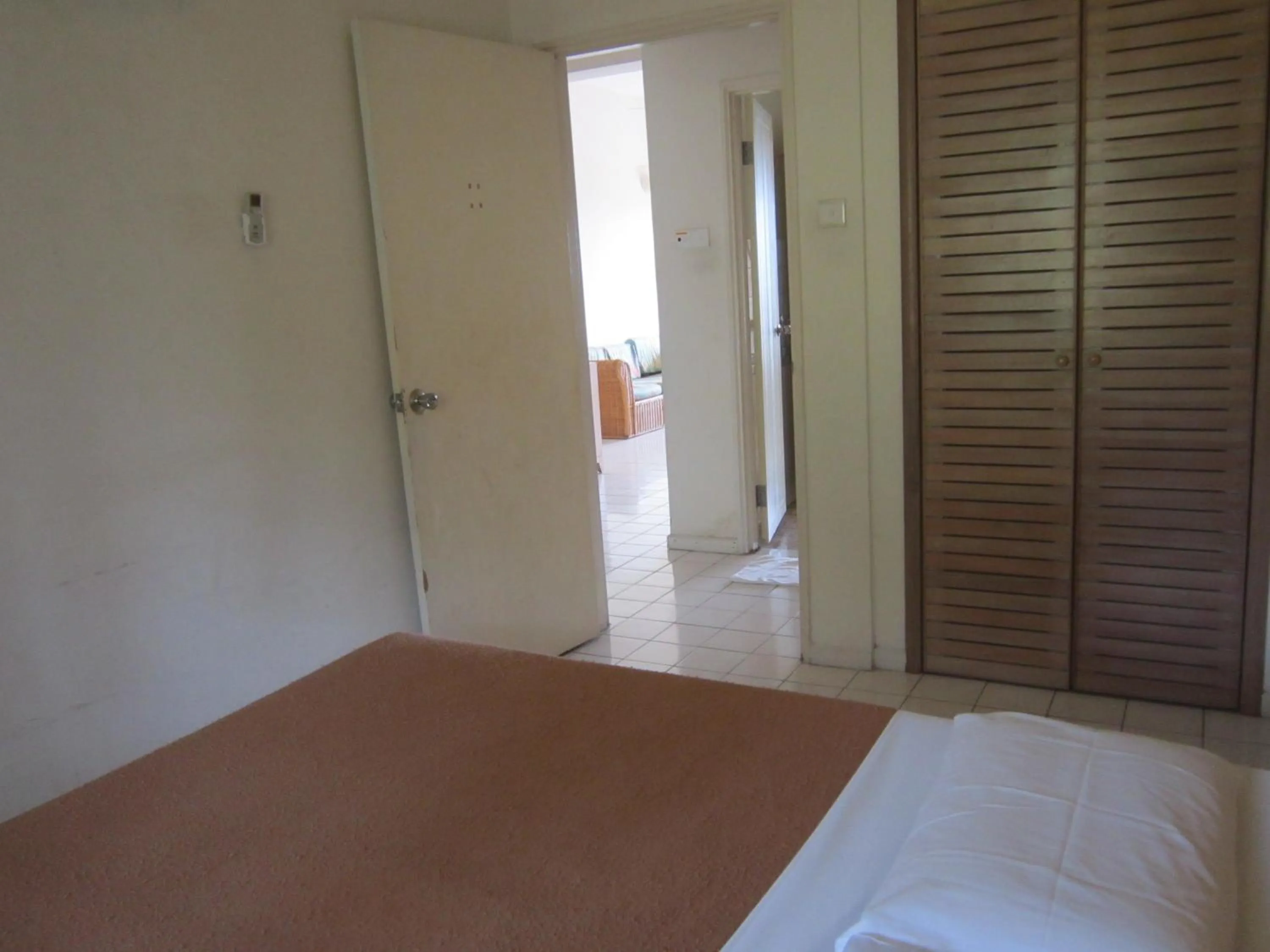 Bed in Paradise Lagoon Apartment