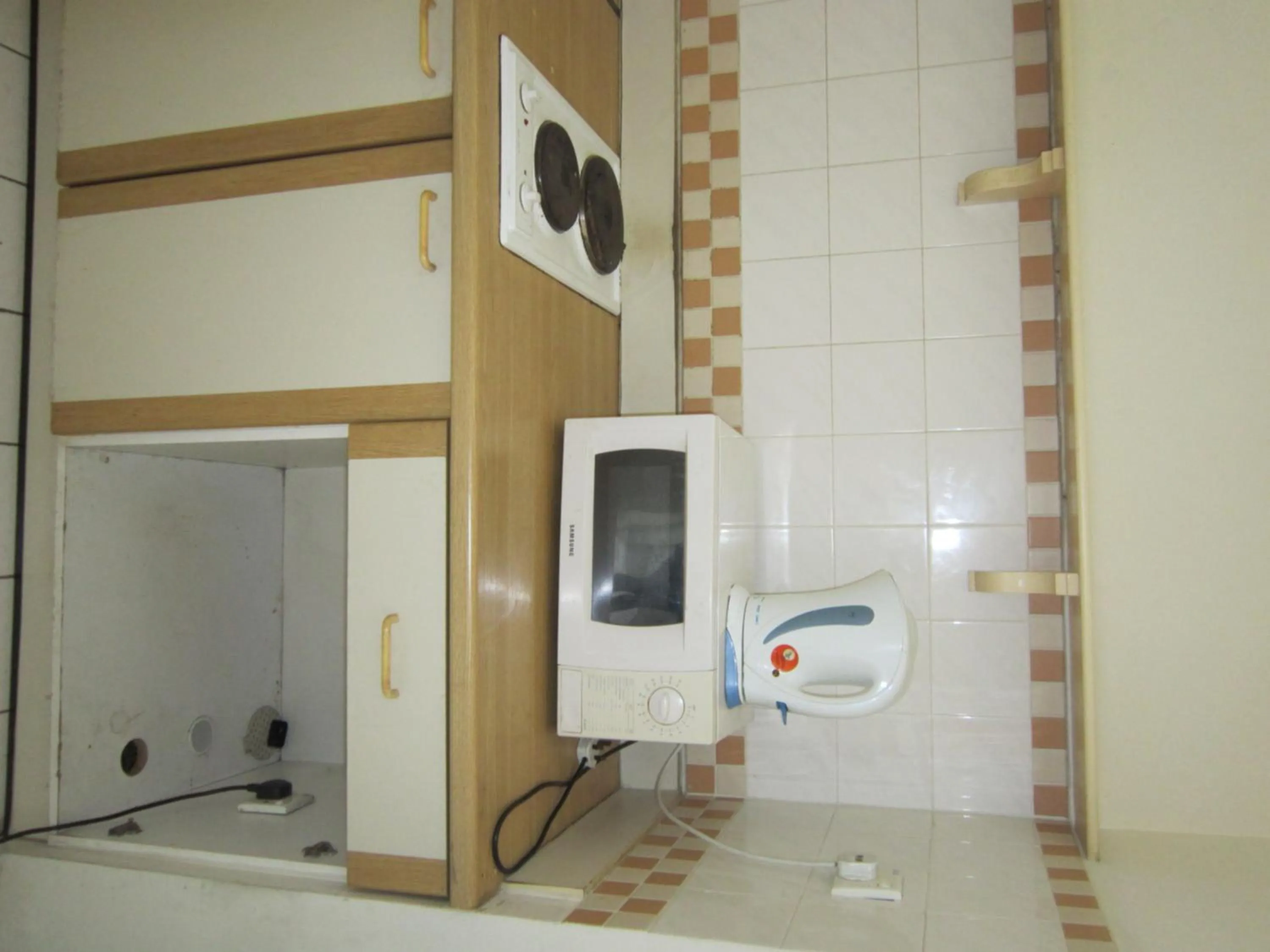 Kitchen or kitchenette in Paradise Lagoon Apartment