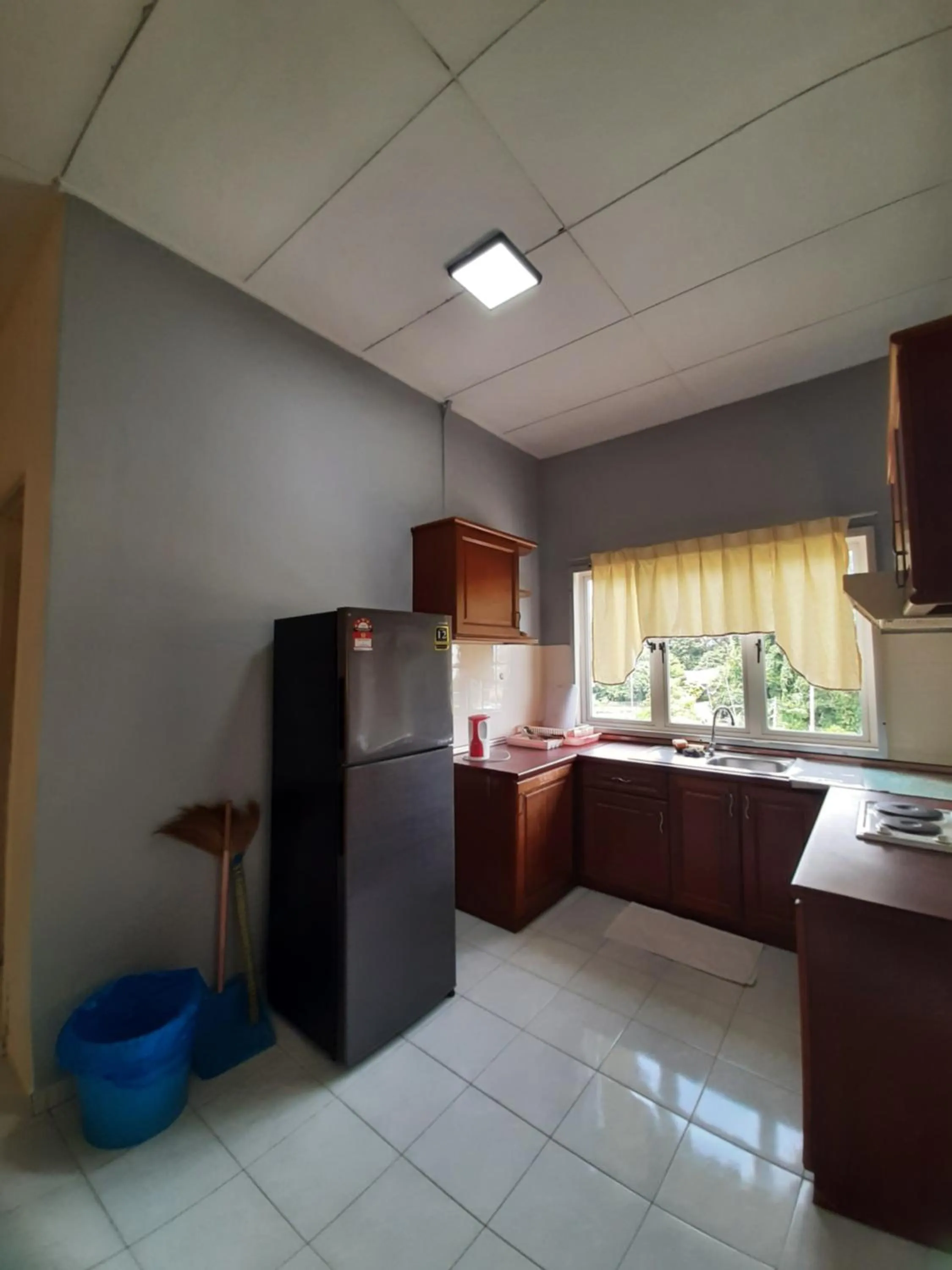 Kitchen or kitchenette, Bed in Seri Bulan Condo