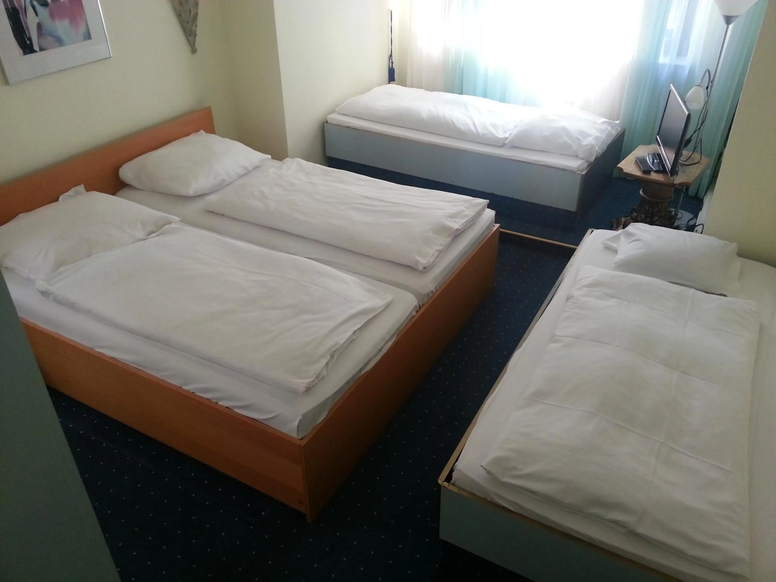 Bed in Hotelgarni Frankfurt