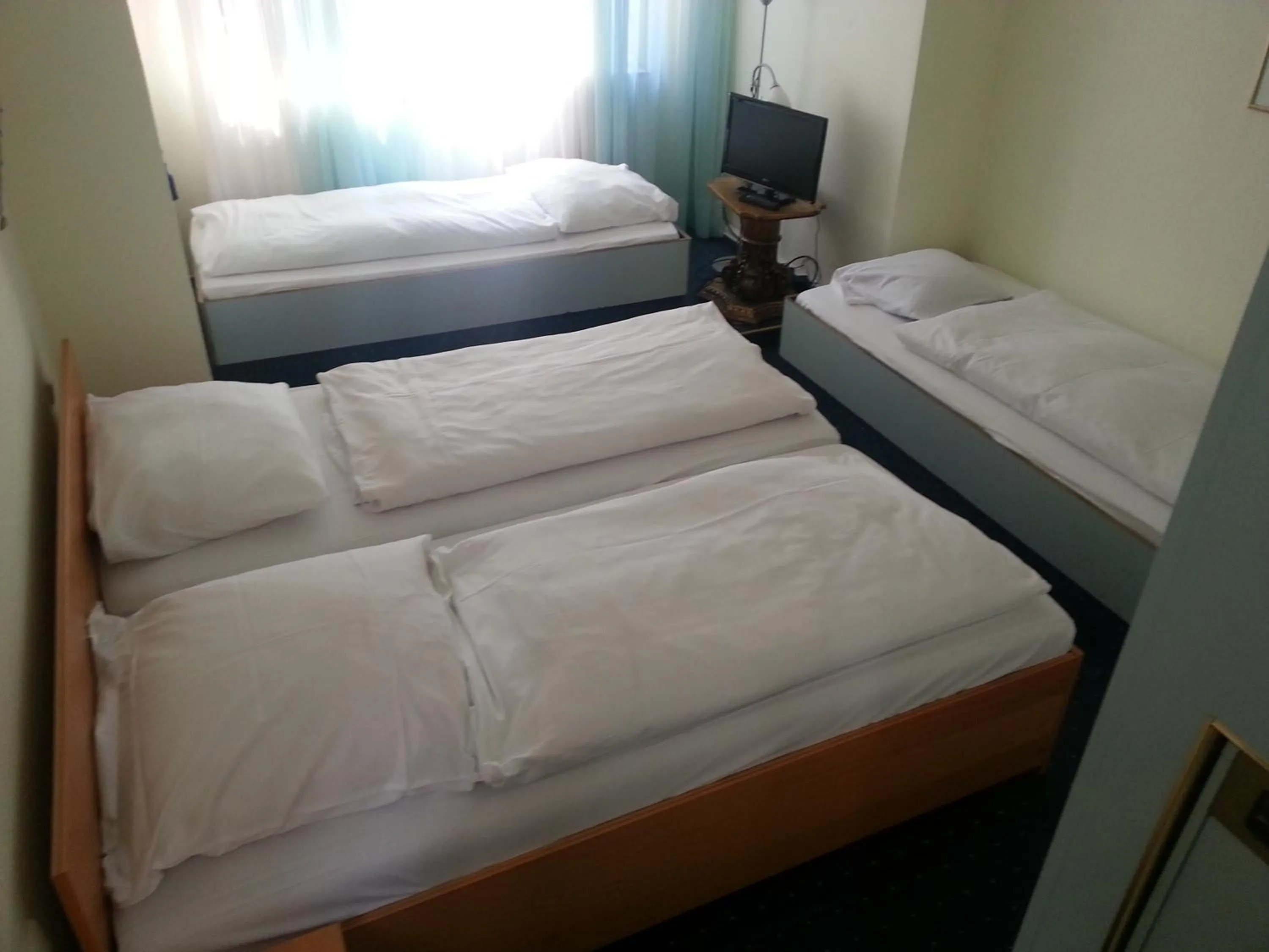 Bed in Hotelgarni Frankfurt