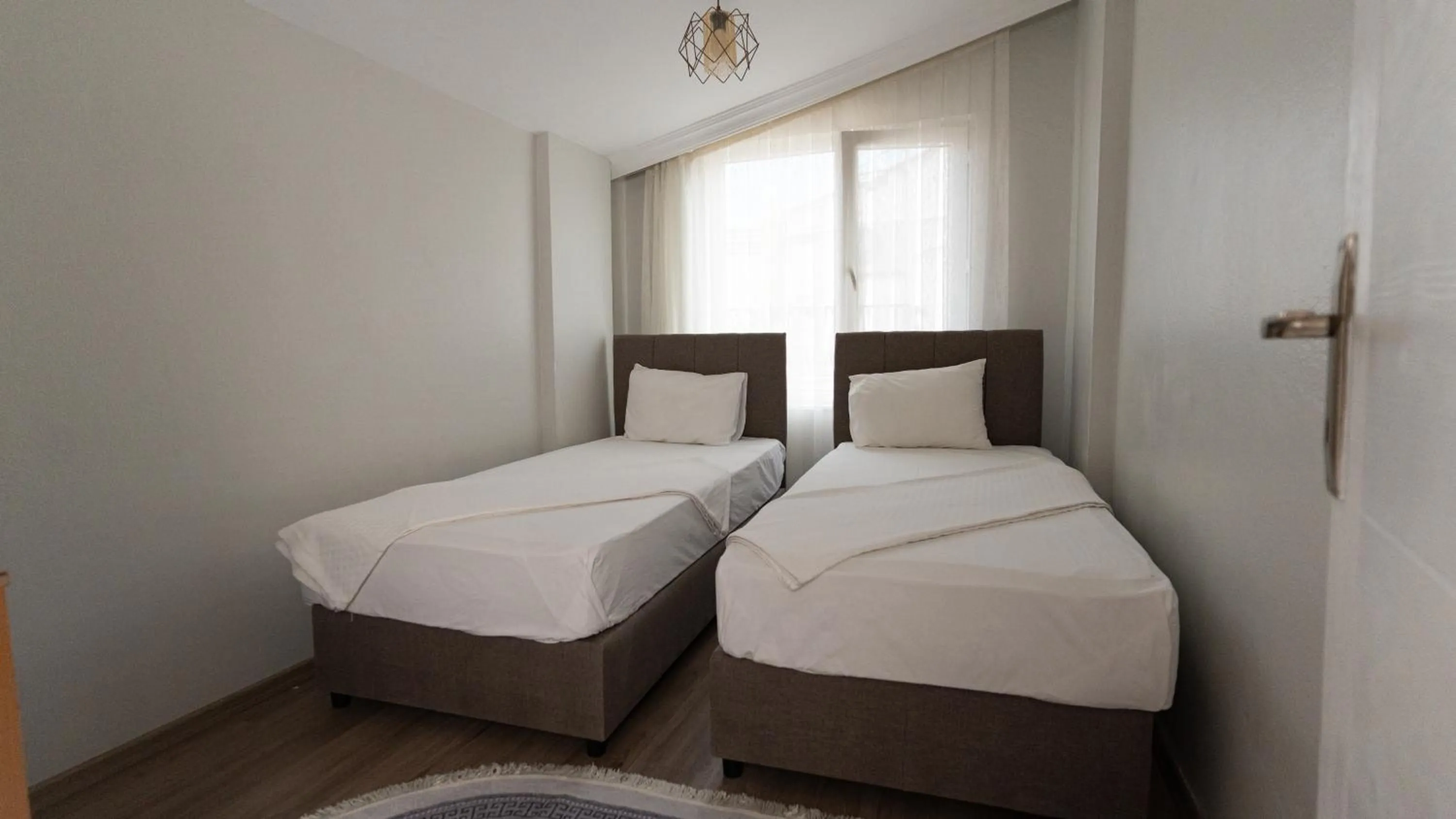 Bed in Yade Apart Pension